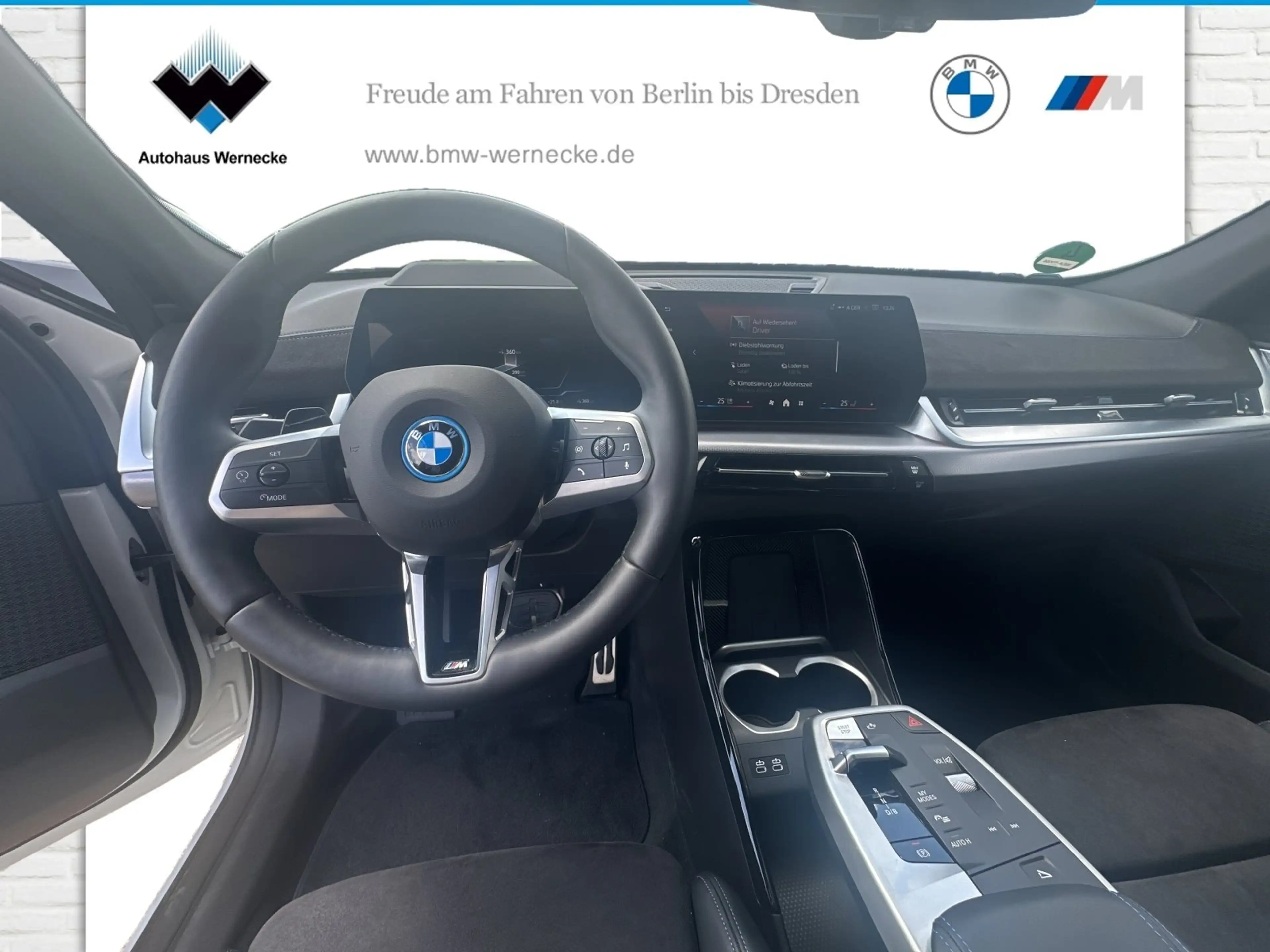 BMW iX2 xDrive30 — photo 11