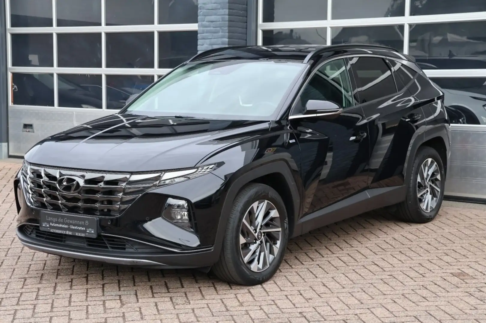 Hyundai TUCSON 1.6 T-Gdi MHEV dynamic, automaat, leder, navigatie Schwarz - 1