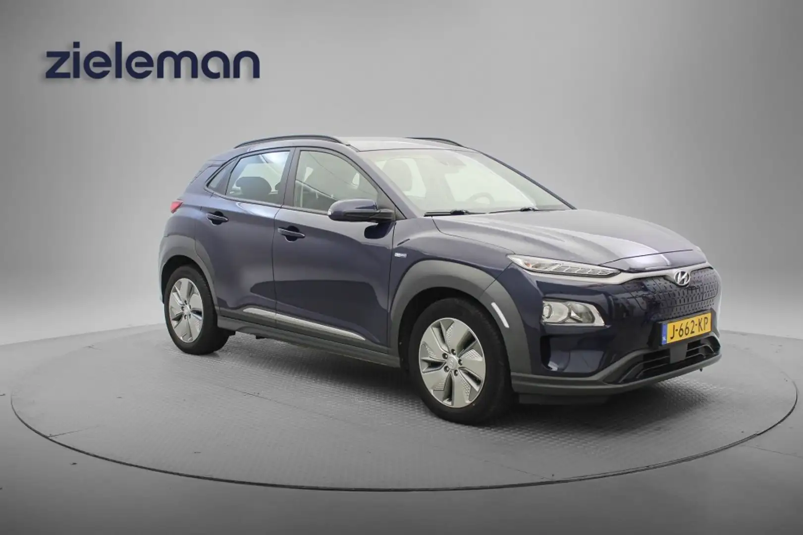 Hyundai KONA Comfort 64 kWh - Carplay, Camera, Navi, Cruise, Cl Azul - 1