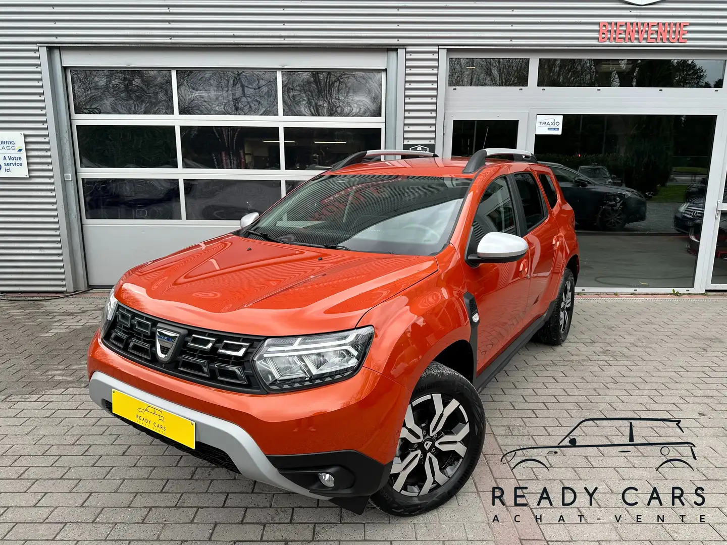 Dacia Duster FULL OPTION*GARANTIE+ENTRETIEN INCLUS JUSQU'A 2027 Orange - 1