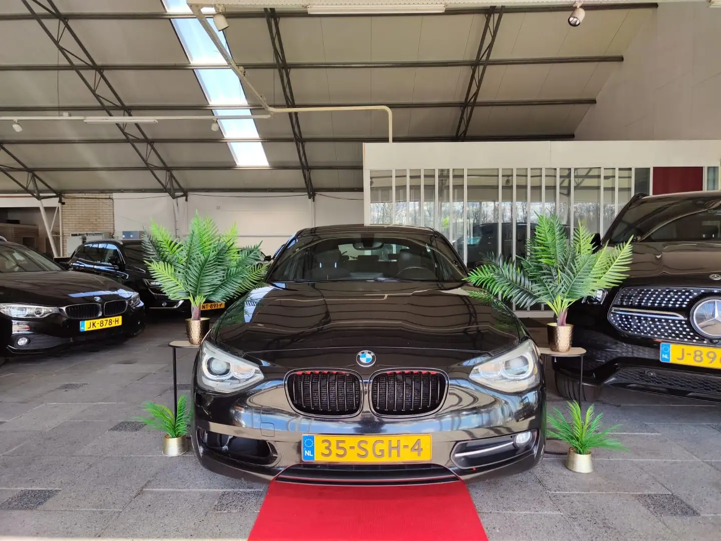 BMW 116 1-serie 116i 5DR BUSINESS ORGINAL KM! 2011 Zwart - 1