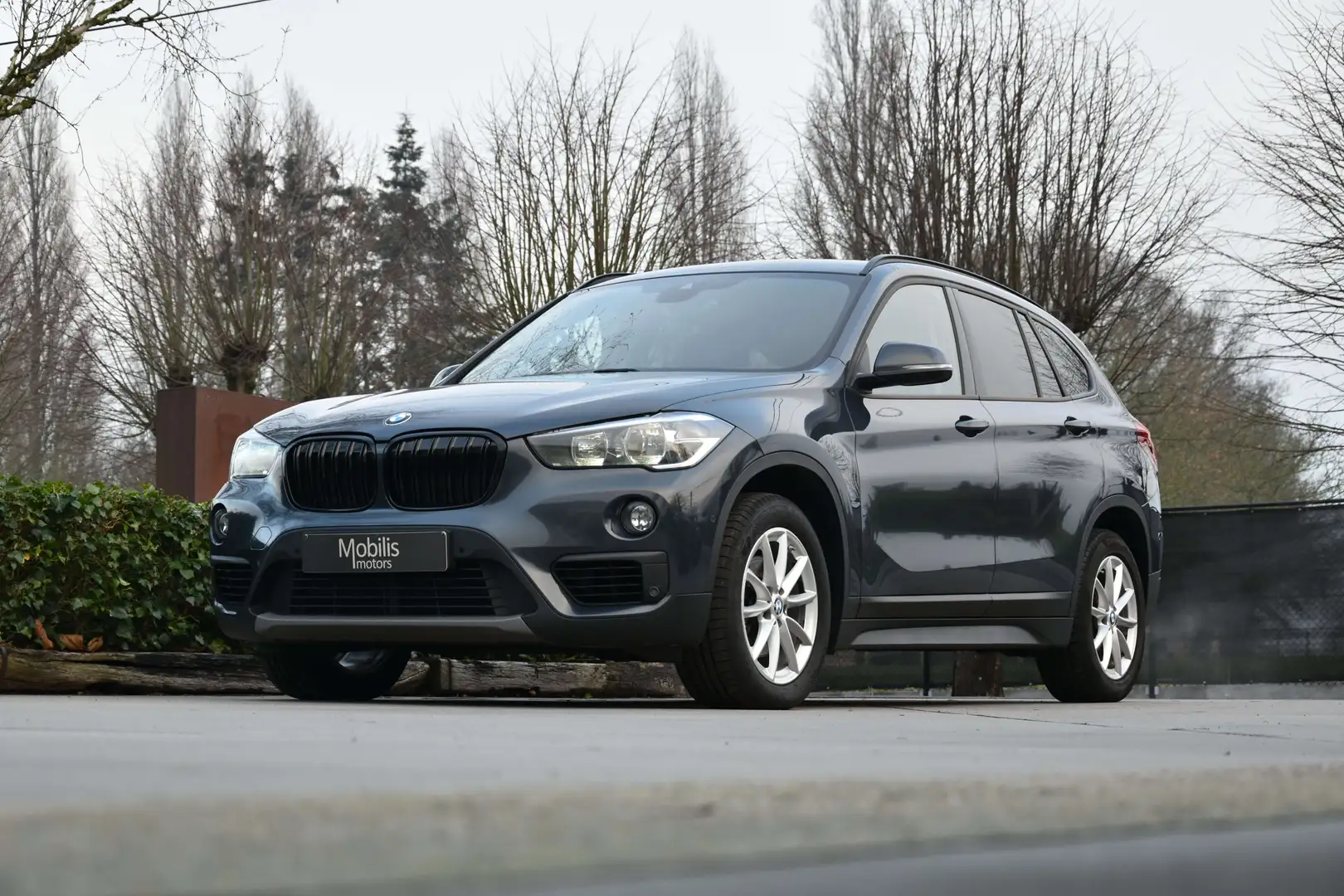 BMW X1 dA sDrive16 Automaat/Navi Pro/ParkAssist Grijs - 2