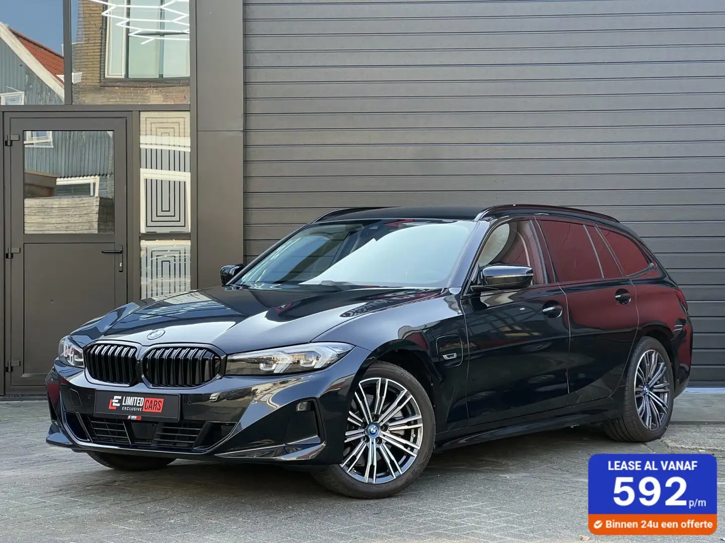 BMW 320 3-serie Touring 320e Business Edition Plus | HEADU Zwart - 1
