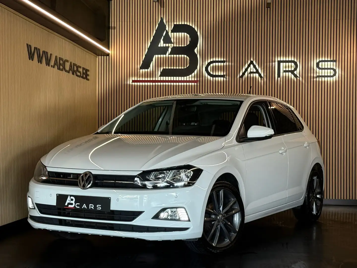 Volkswagen Polo 1.0 TSi Highline * GAR 12 MOIS * 1ER PROP * Grijs - 1