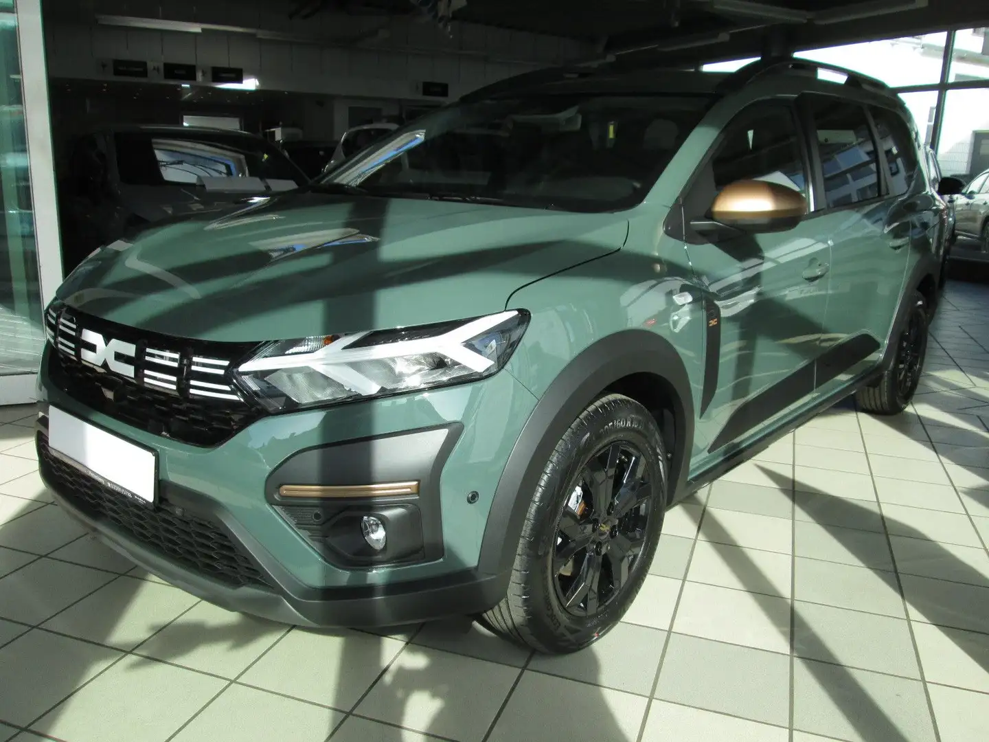 Dacia Jogger Extreme+ *CITYPAKET*NAVI*SHZ*ERAD*7SITZER Grün - 1