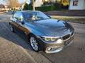 BMW 420 420d Cabrio Aut. Luxury Line Grijs - thumbnail 1