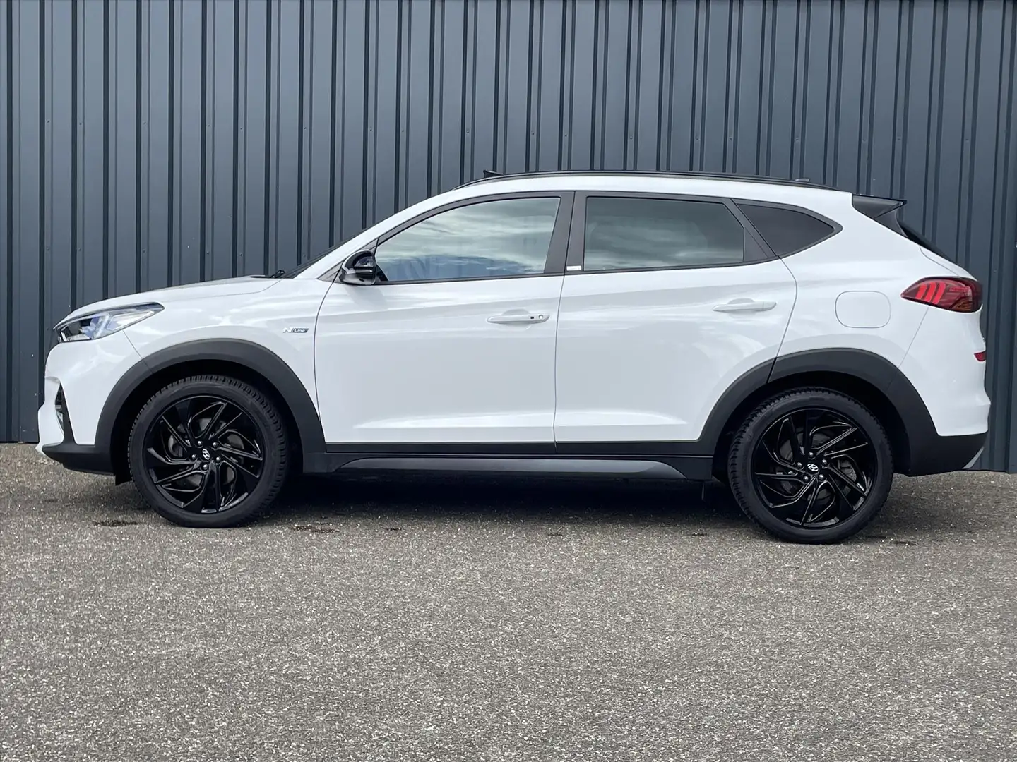 Hyundai TUCSON 1.6 T-GDi 177pk 7-DCT N-Line Navi | Schuifdak | Au Wit - 2
