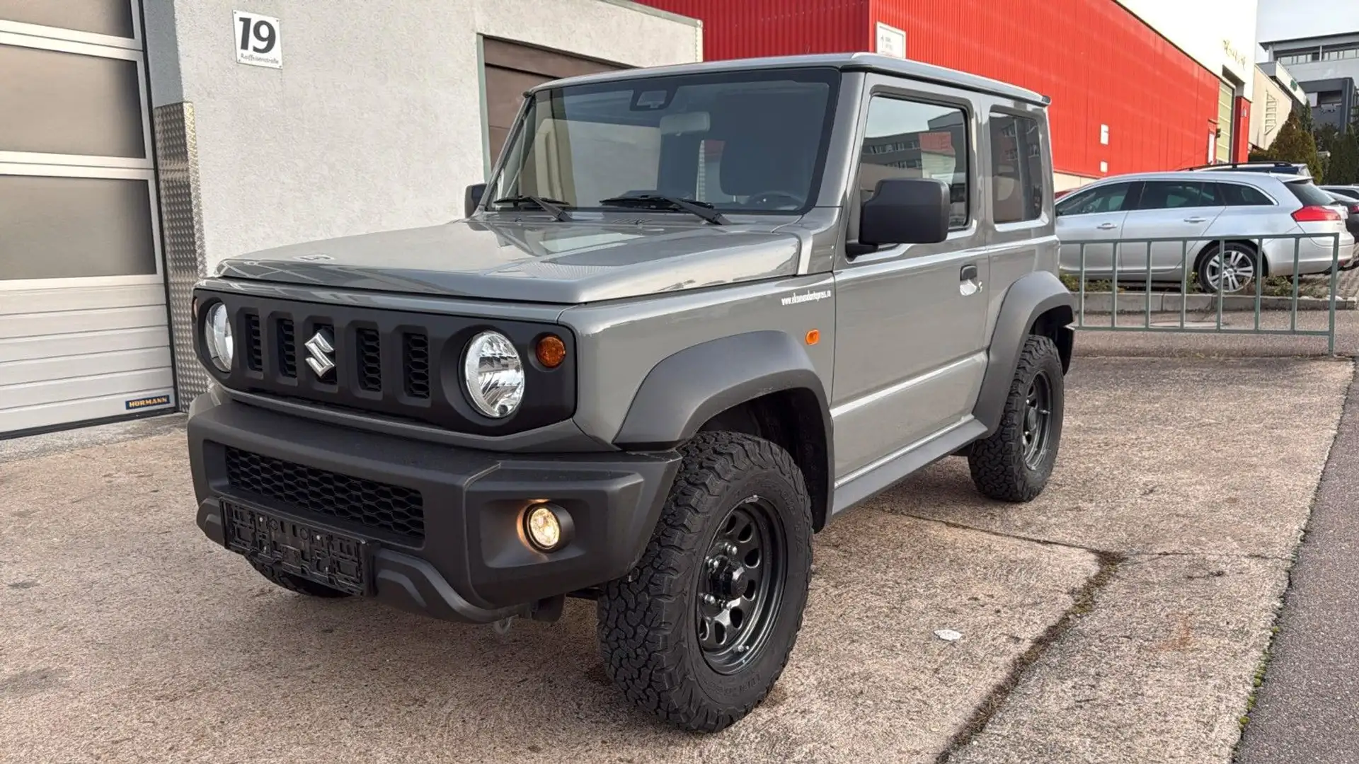 Suzuki Jimny Comfort AllGrip AHK Grau - 1