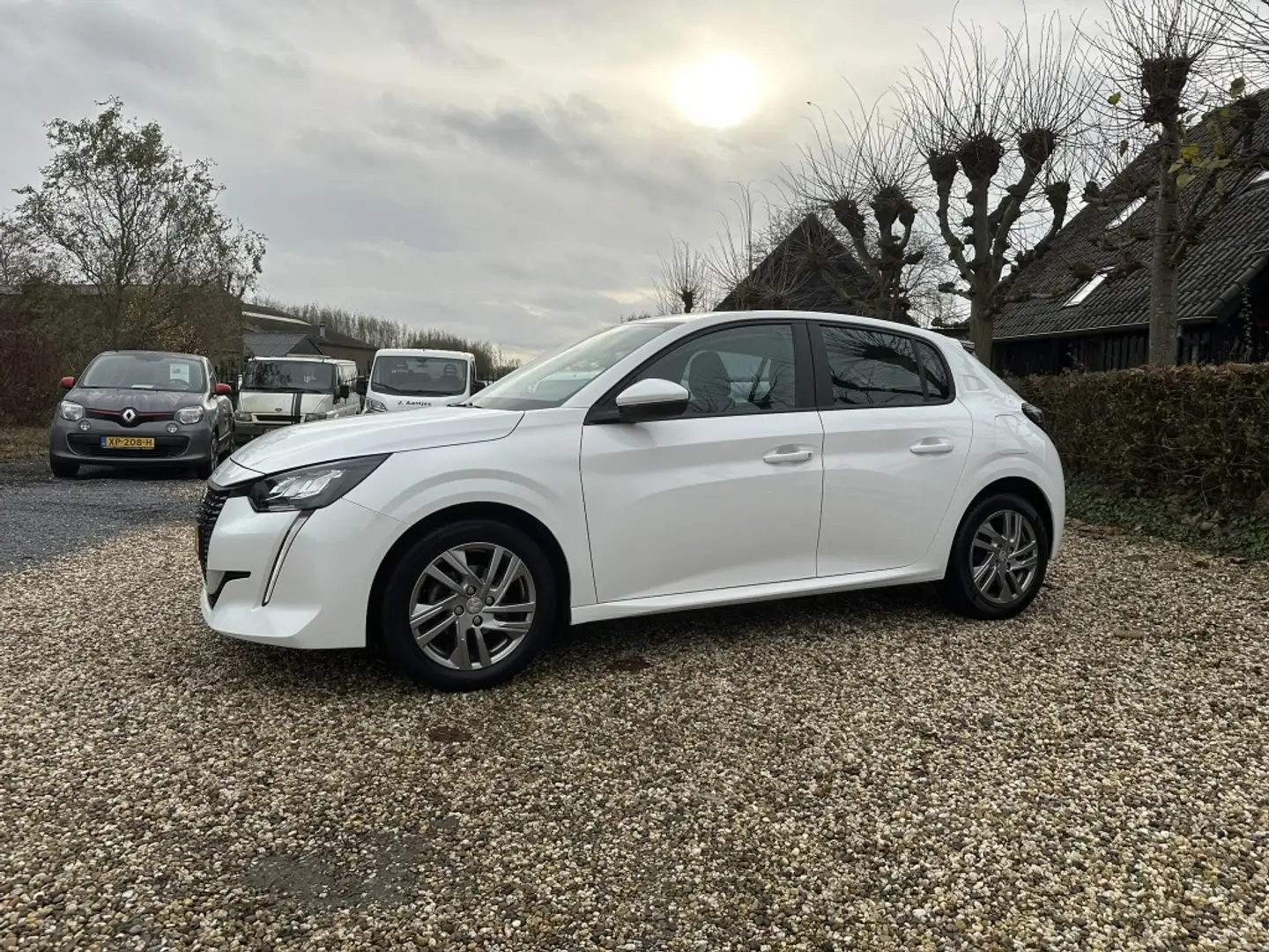 Peugeot 208 1.2 Navigatie/Camera/PDC/Carplay Blanco - 1