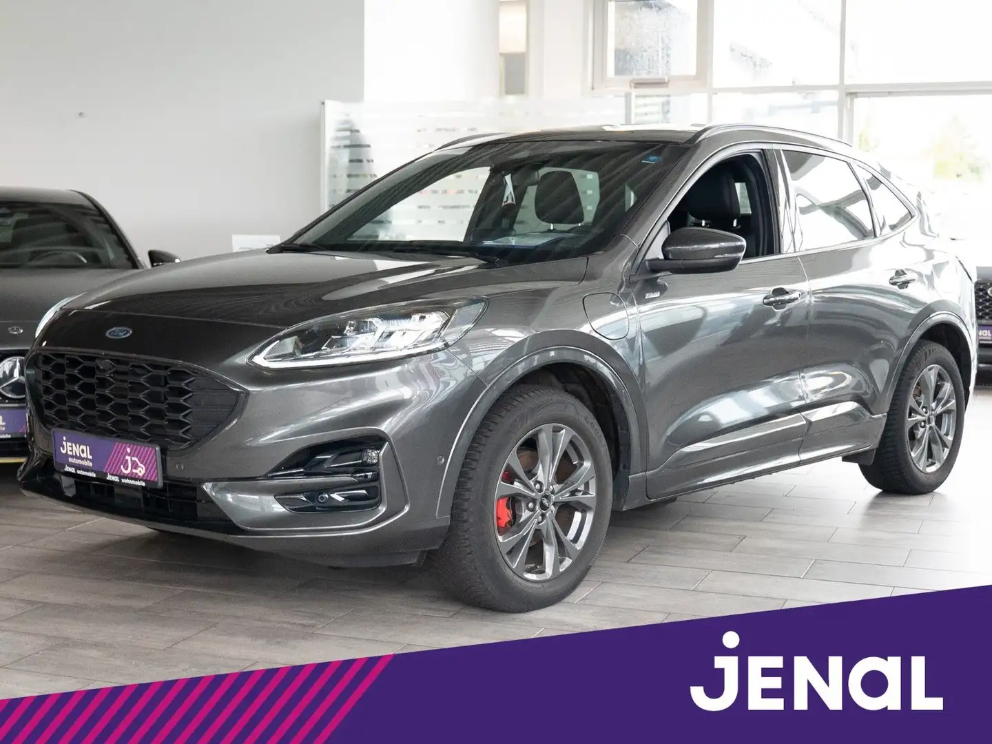Ford Kuga PHEV ST-Line X AUTOM./AHK/PANO/NAVI Grijs - 1