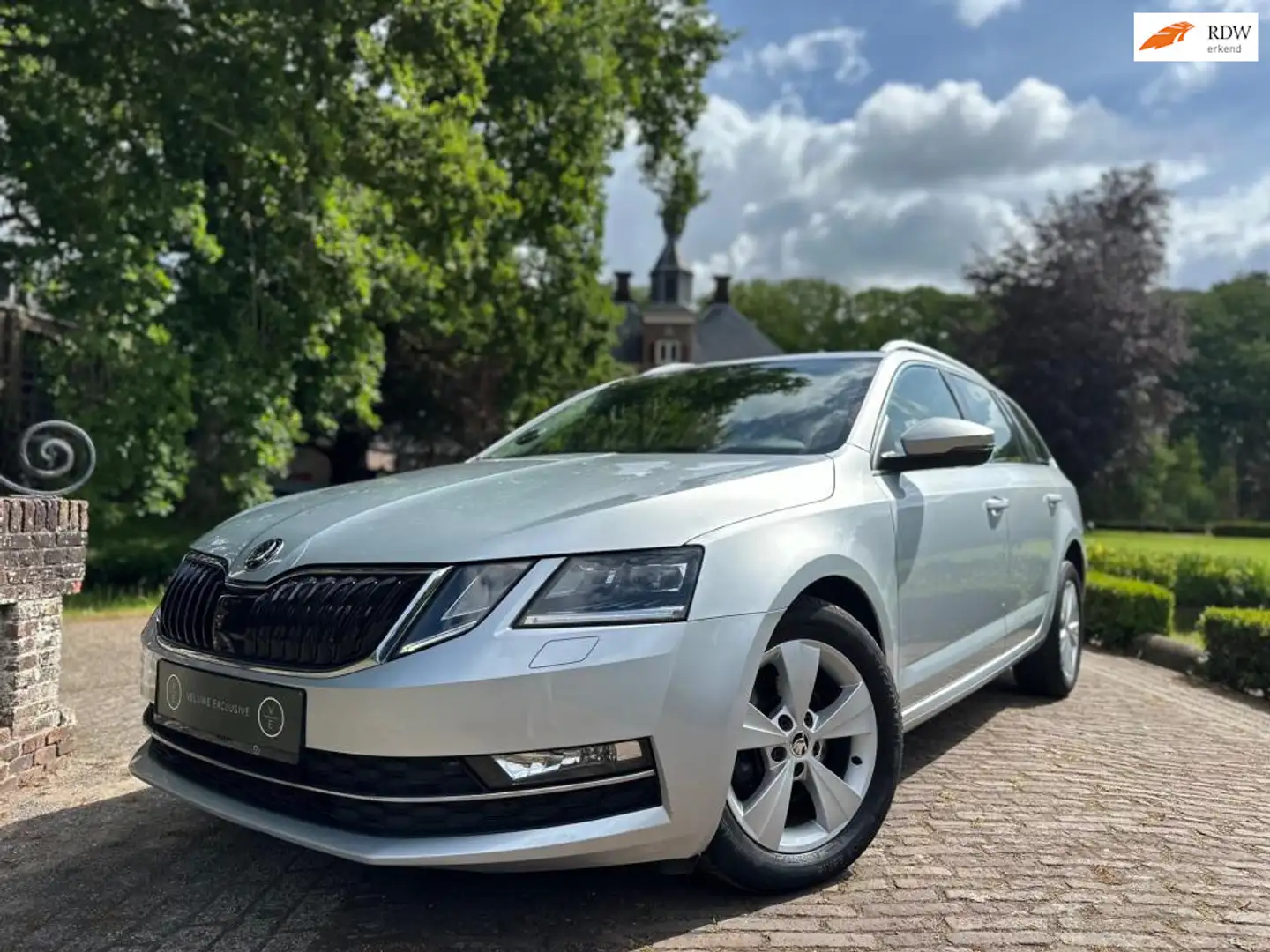 Skoda Octavia Combi 1.0 TSI | Business | DSG | PDC | CarPlay | L Zilver - 1
