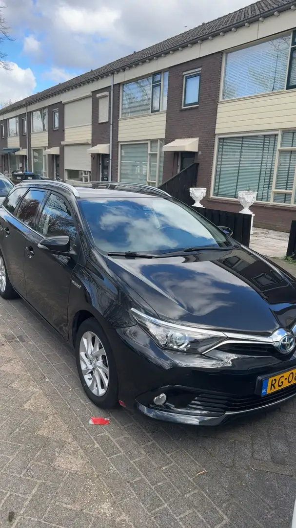 Toyota Auris 1.8 Hybr. Dynamic Go Zwart - 1