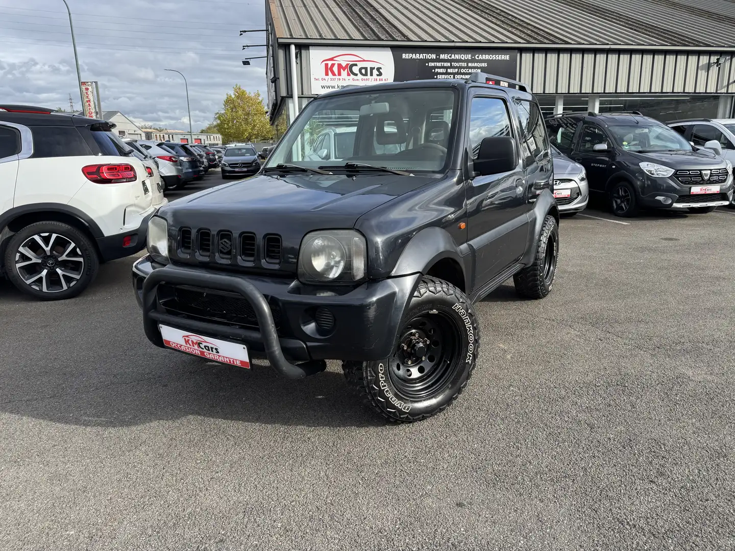 Suzuki Jimny 1.3i ESSENCE // CLIMATISATION // Noir - 1