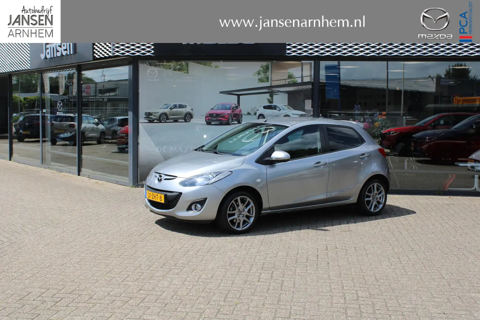 Mazda 2 1.3 Navigator GT , Trekhaak, Navi, Clima, Stoelver Grijs - 1