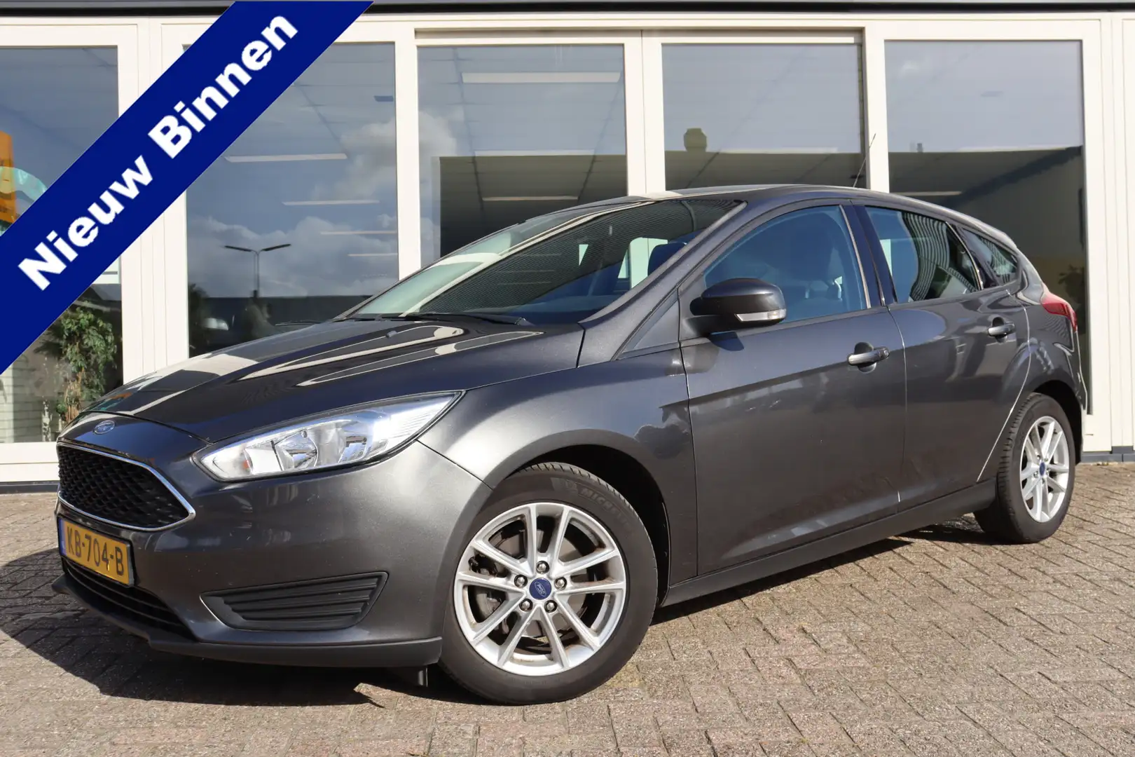 Ford Focus 1.0 Trend, Cruise Control, Airco, PDC V+A, Prijs I Gris - 1