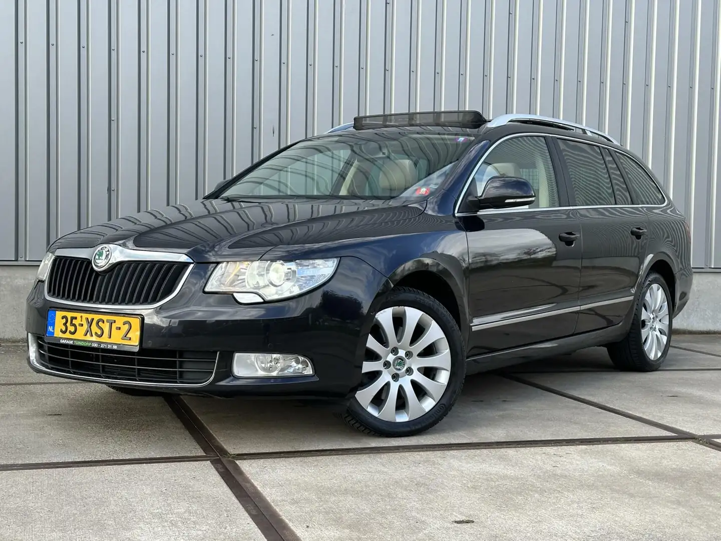 Skoda Superb Combi 2.0 TSI DSG - Pano - Xenon - Leder - Volle A Zwart - 1