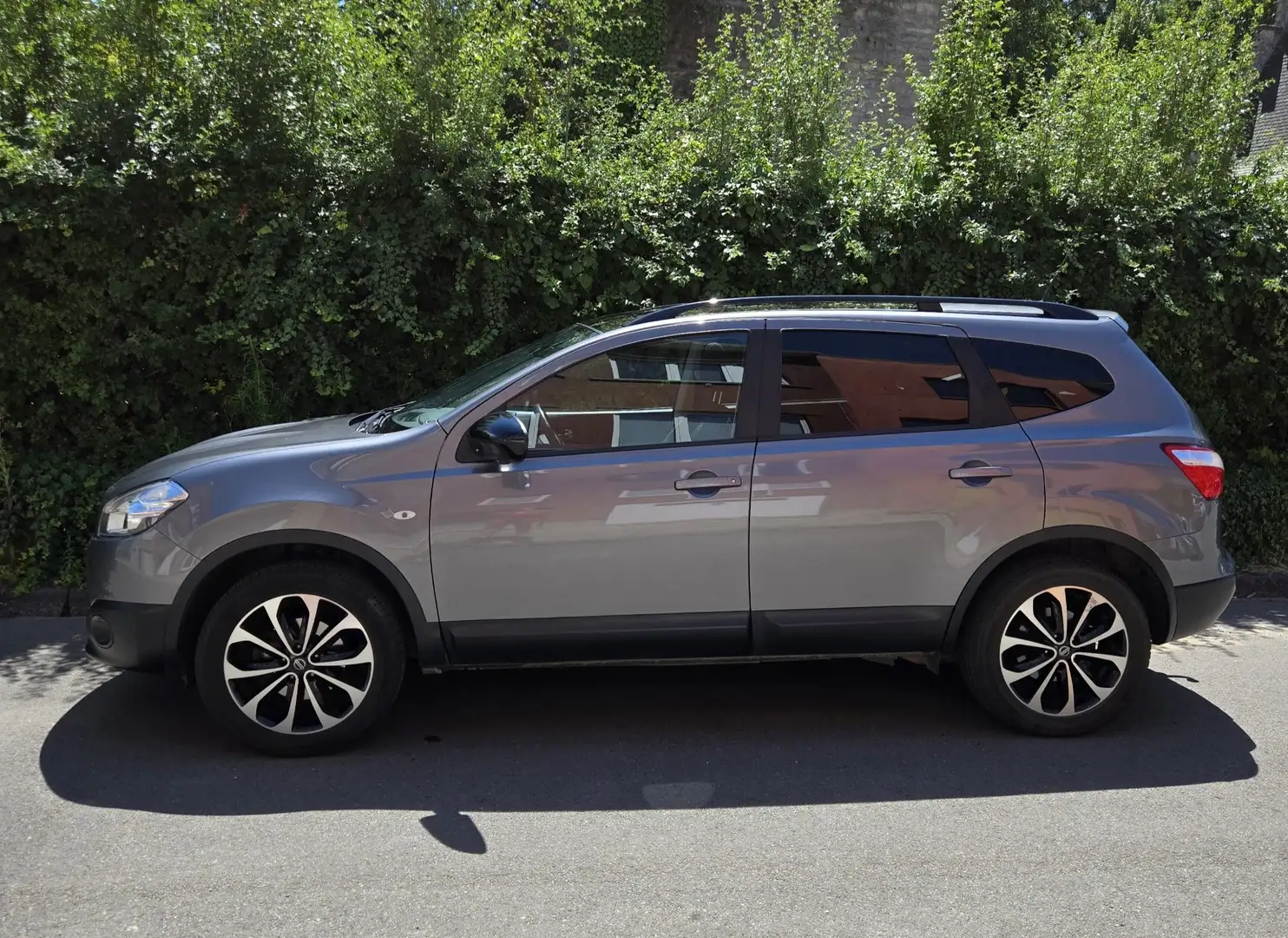 Nissan Qashqai+2 1.6i 2WD+7PL+360° Camera+Clim+Panoramic+JA18 Grijs - 2