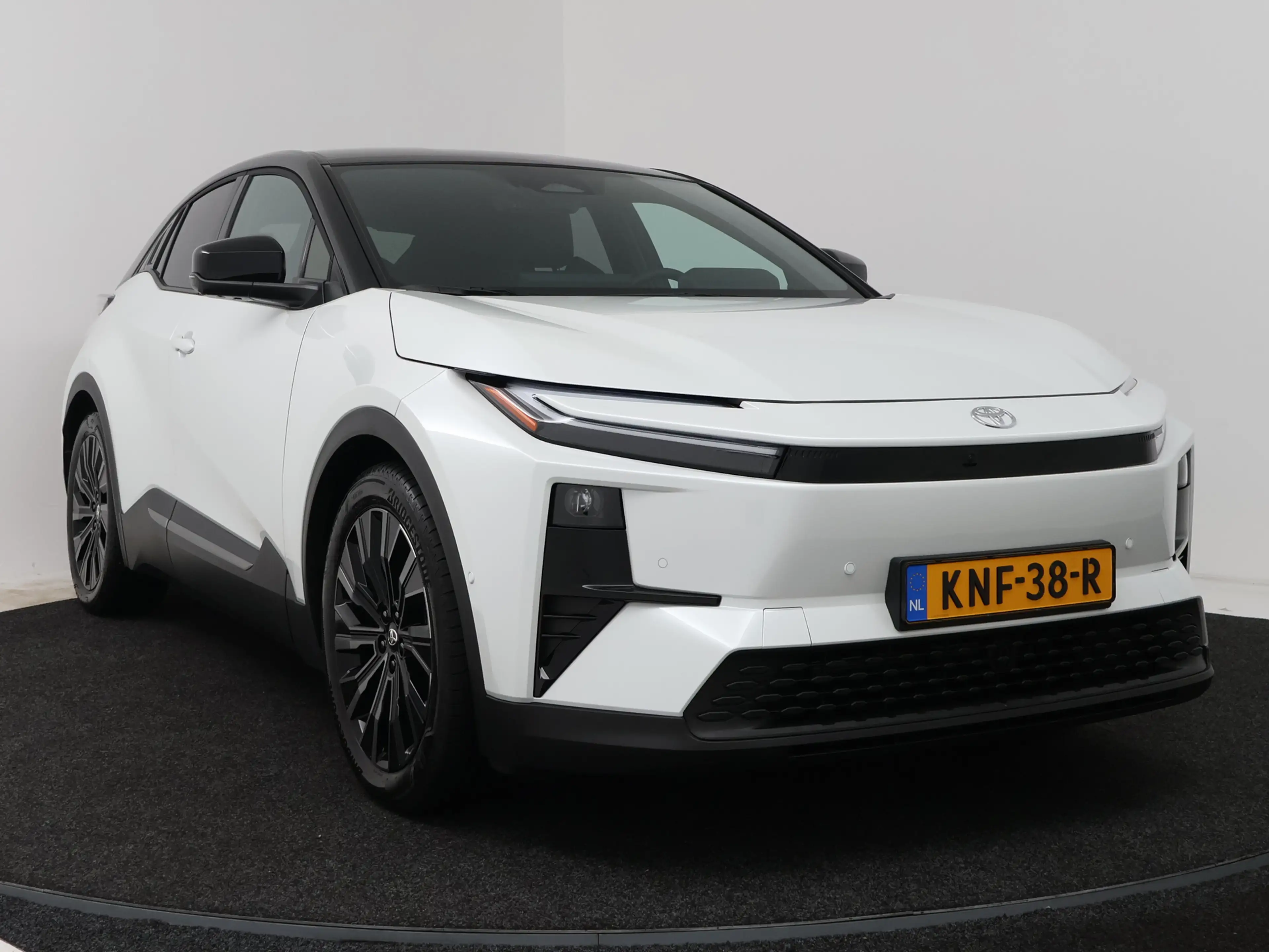 Toyota C-HR+ Executive AWD 77 kWh | Navigatie | PDC | Demo Sand — photo 15