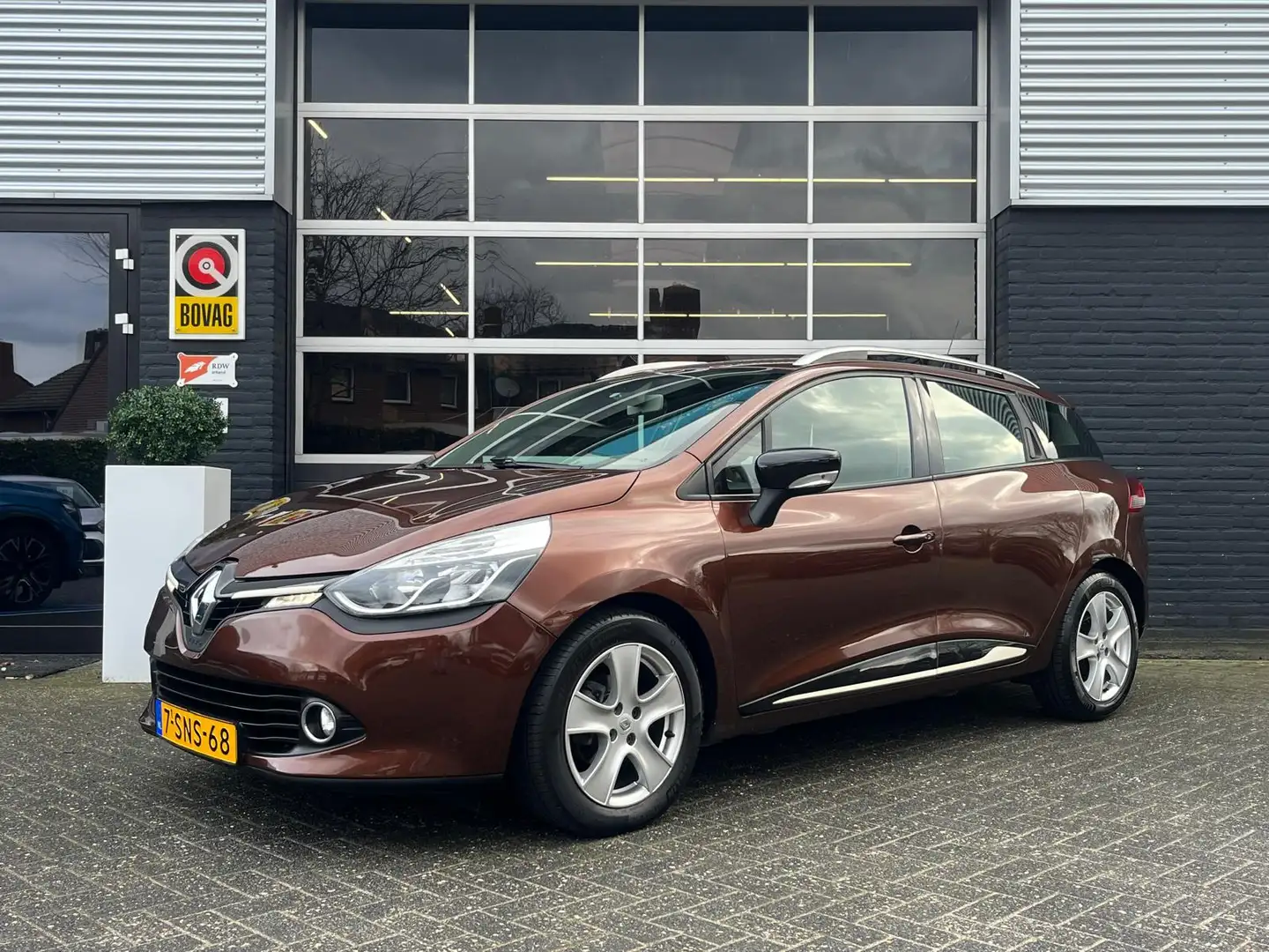 Renault Clio Estate Dynamique, Airco, Bluetooth, Cruise, Navi, Braun - 1