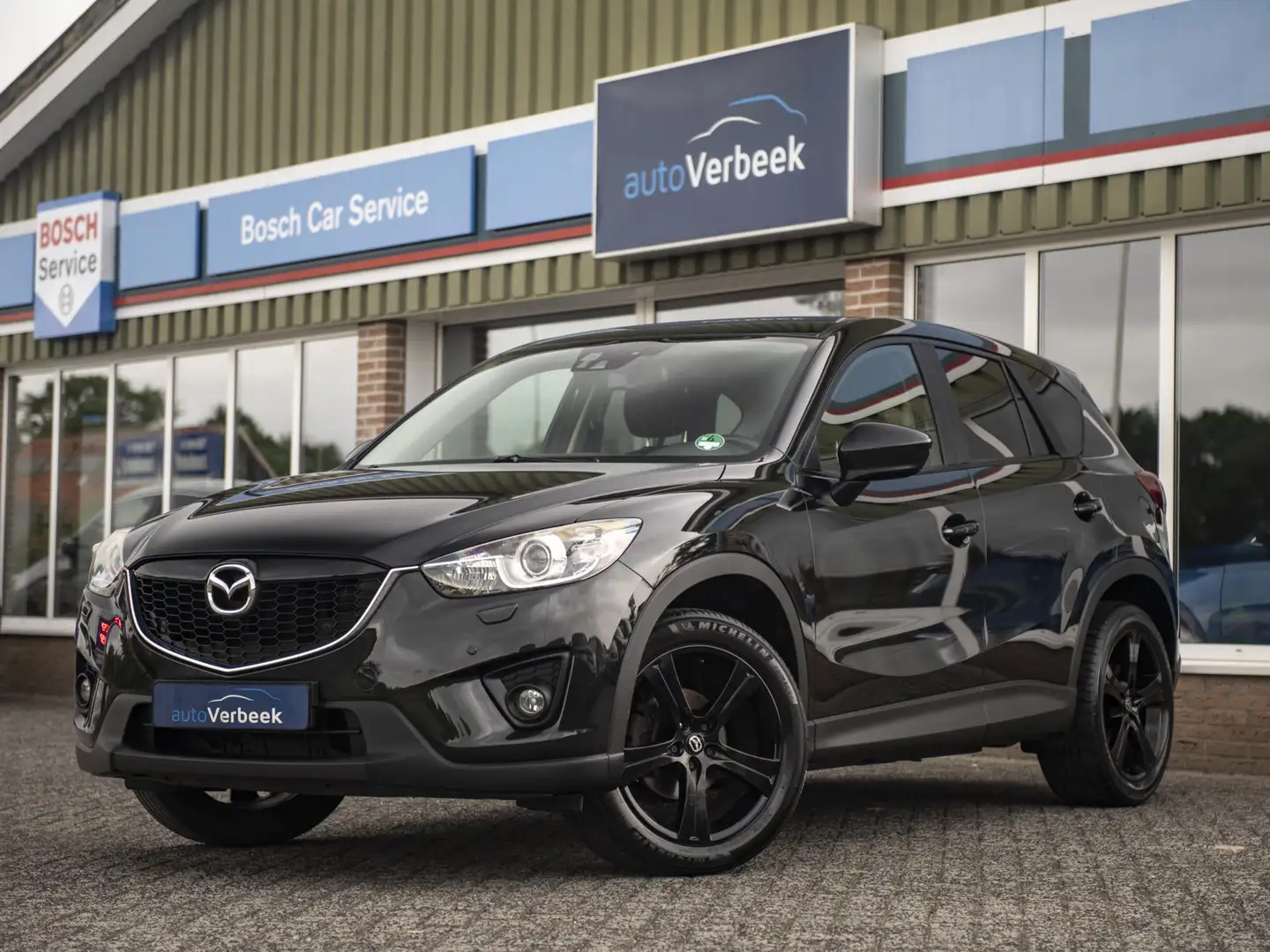 Mazda CX-5 2.0 TS+ Lease Pack 2WD | Trekhaak | Navi | Bi-Xeno Zwart - 1