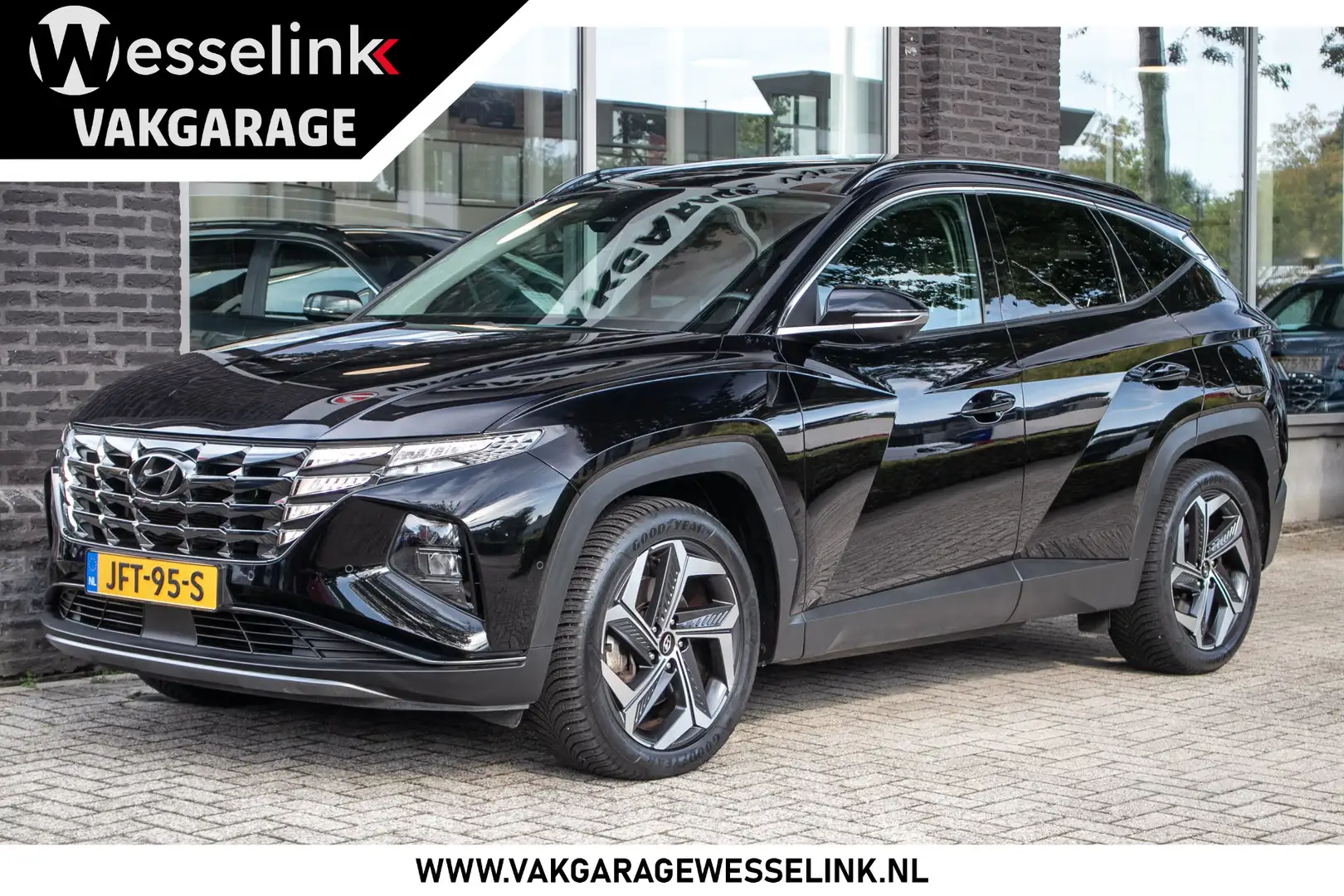 Hyundai TUCSON 1.6 T-GDI PHEV Premium Sky 4WD Navi | Stoelverkoel Noir - 1