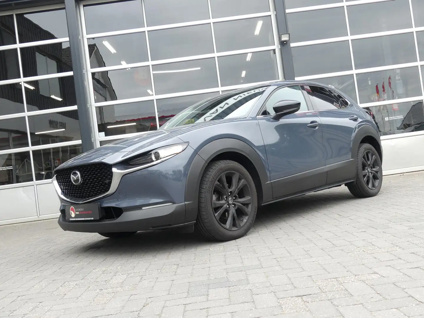 Mazda CX-30 2.0 e-SkyActiv-X M Hybrid Homura *t/m 10de bouwjaa Grijs - 2