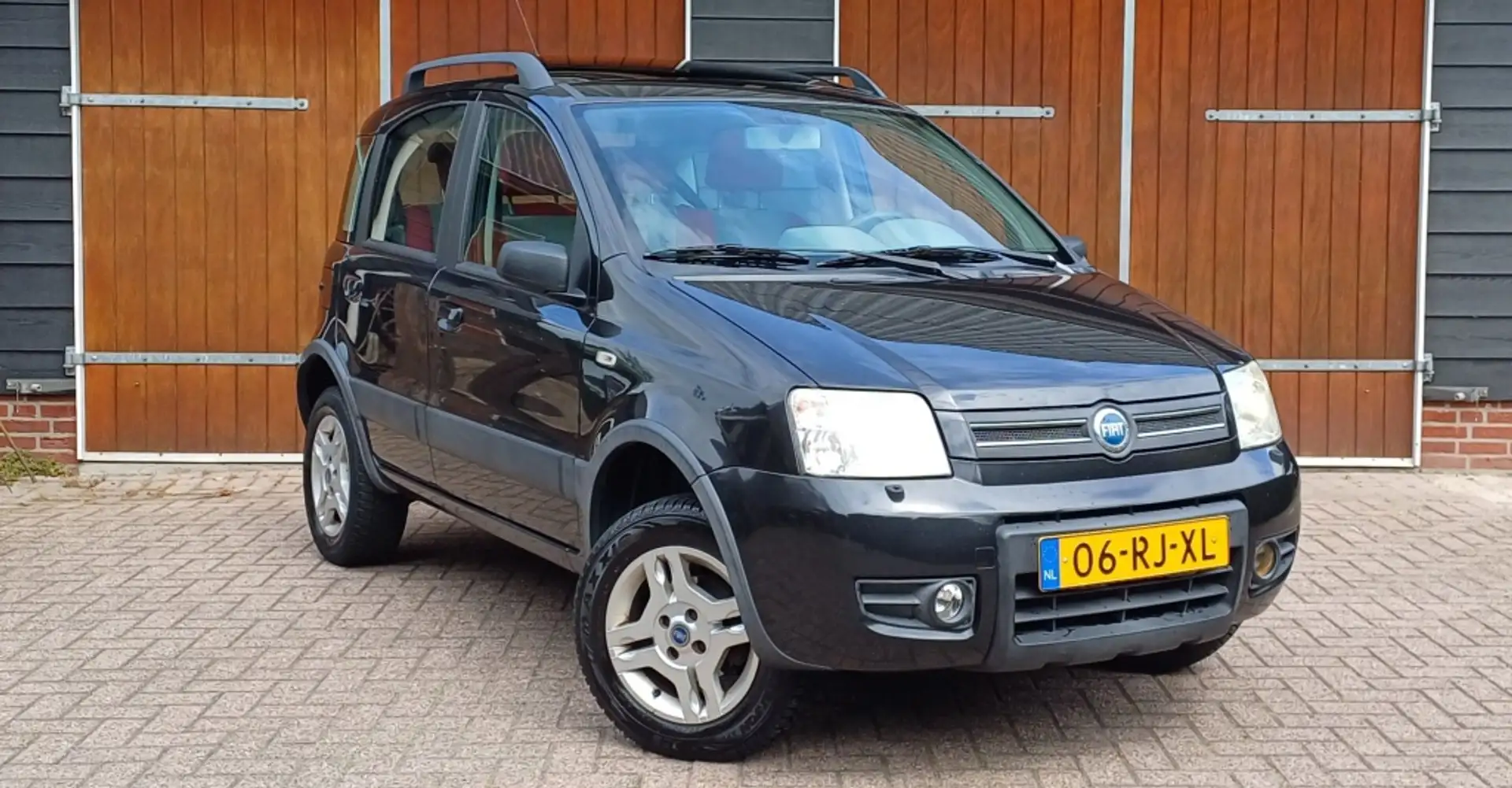 Fiat Panda 1.2 Professional 4x4, Airco, Schuifkantel dak, NAP Zwart - 1