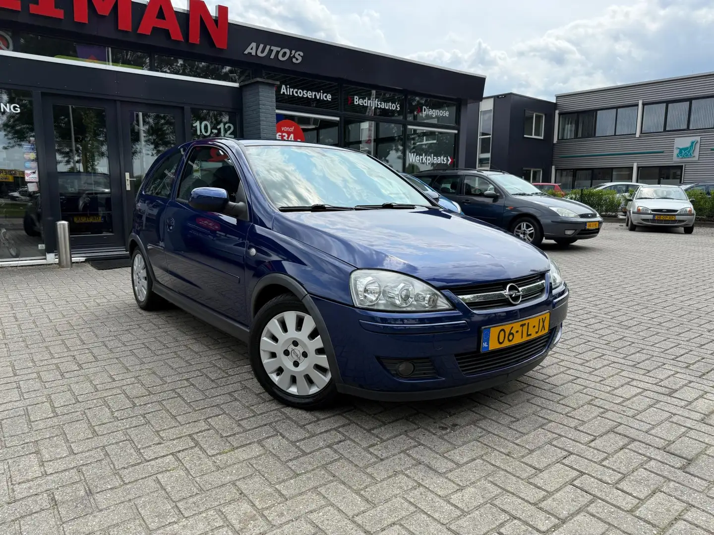 Opel Corsa 1.2-16V Silverline Blauw - 2