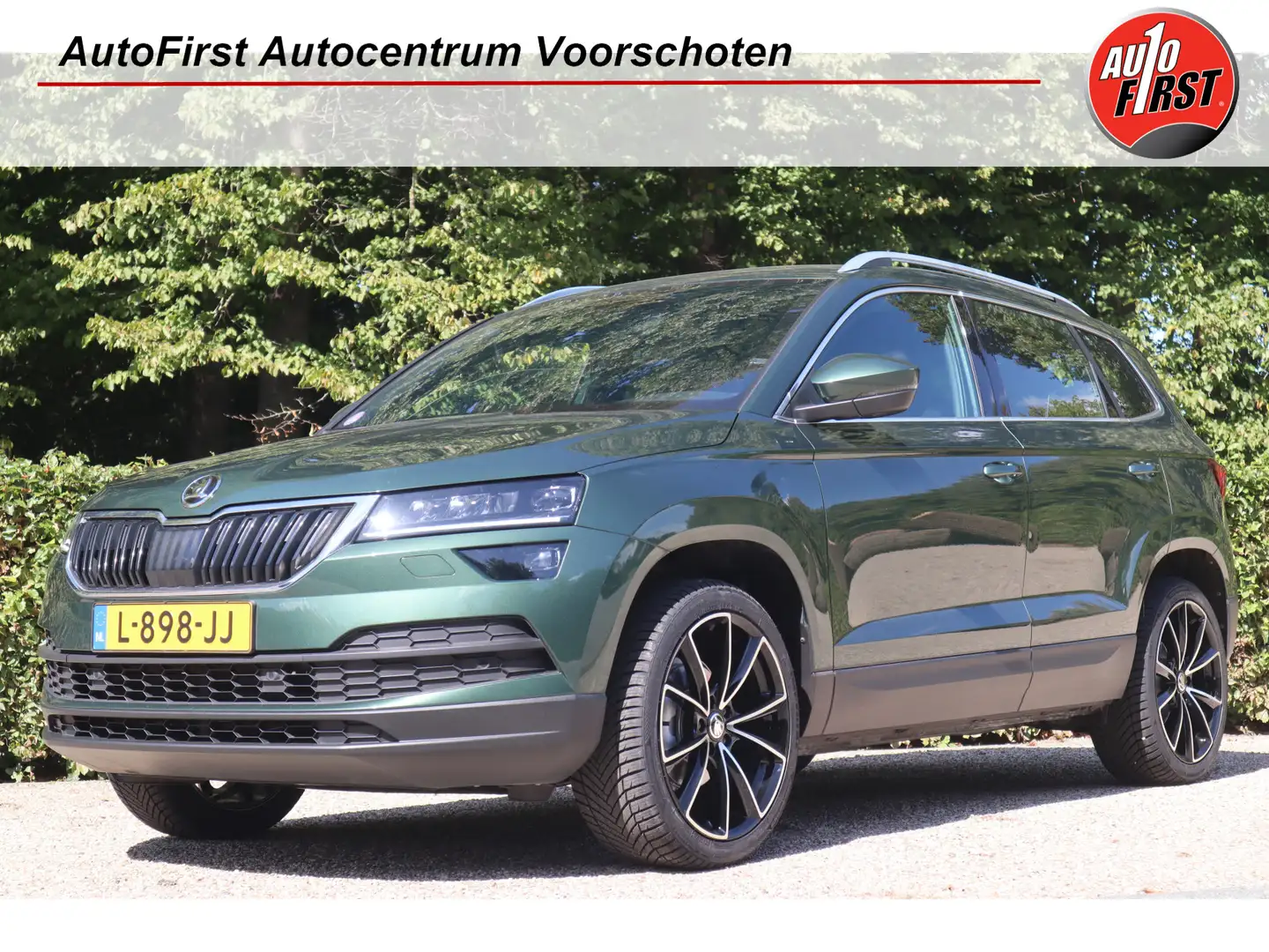 Skoda Karoq 1.0 TSI Business Edition Plus | Camera | Stoelverw Groen - 1
