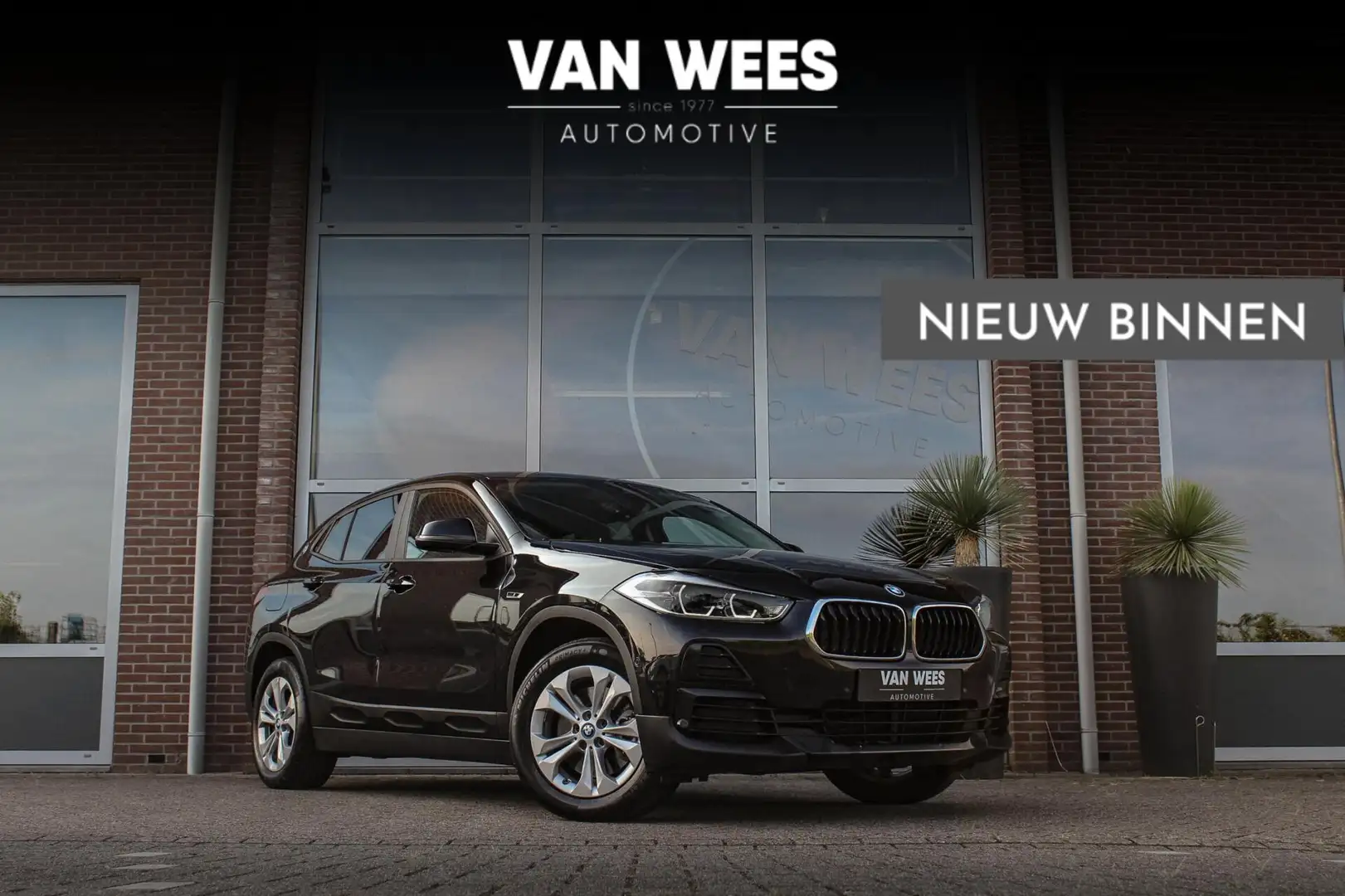 BMW X2 xDrive25e High Executive | 1e eigenaar | inc BTW | Zwart - 1