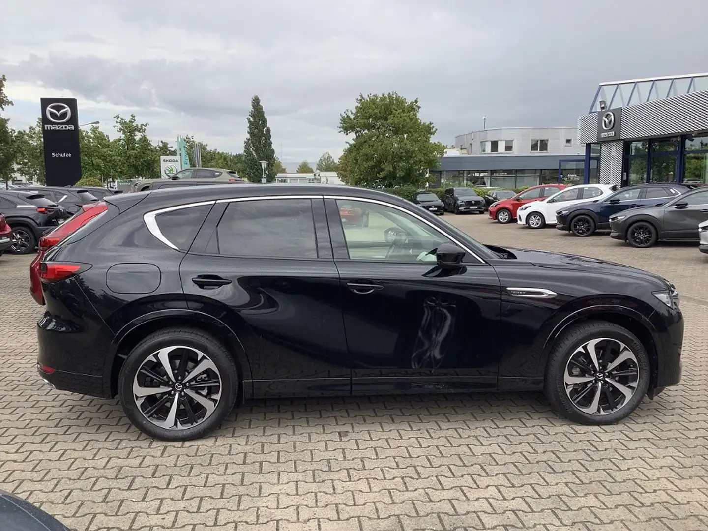 Mazda CX-60 2.5 PHEV Takumi 3 Zusatzpakete AHk schwenkb. +Gara Schwarz - 2