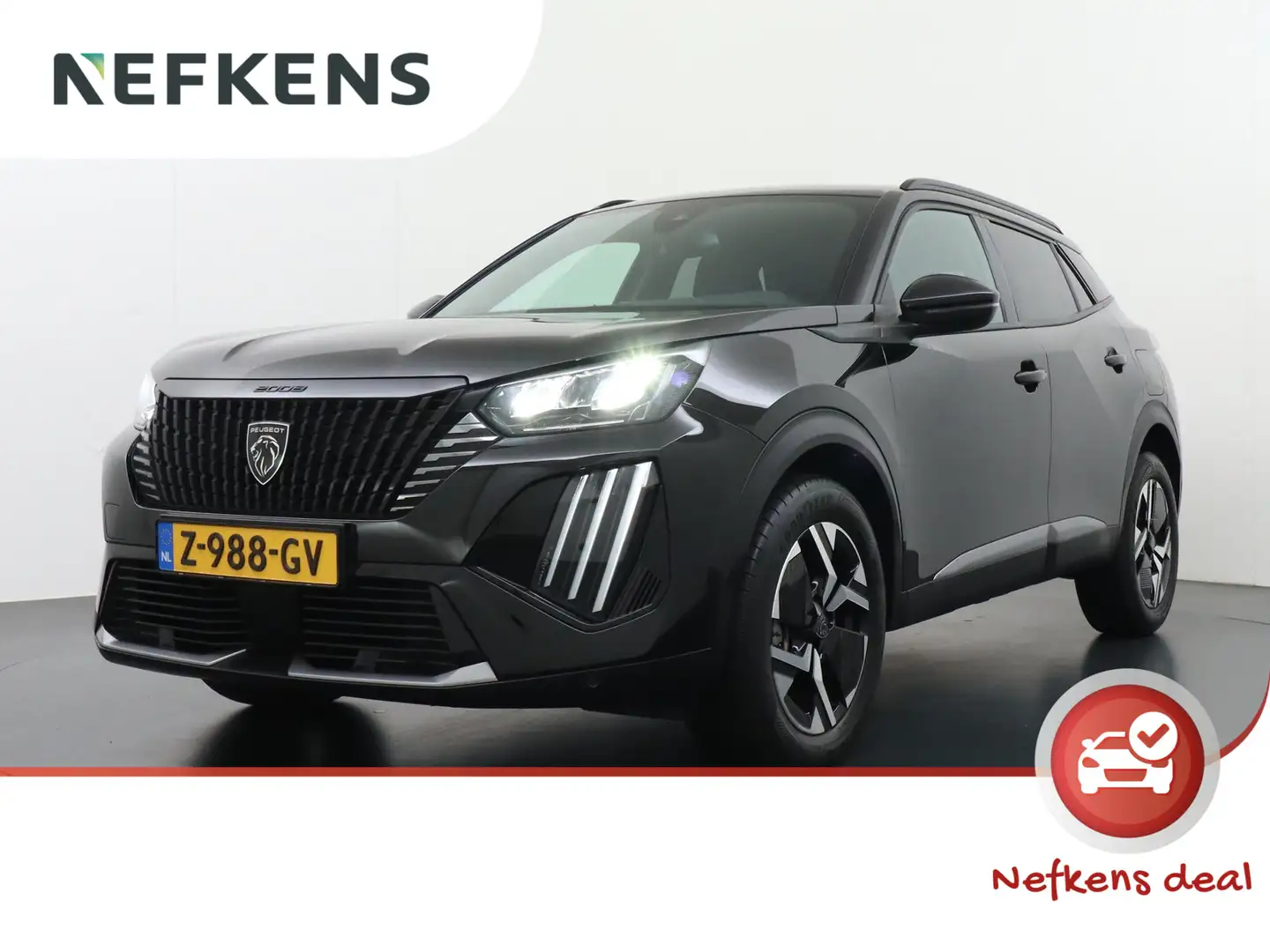 Peugeot 2008 1.2 PureTech 100 Allure | Navigatie | Camera achte Zwart - 1