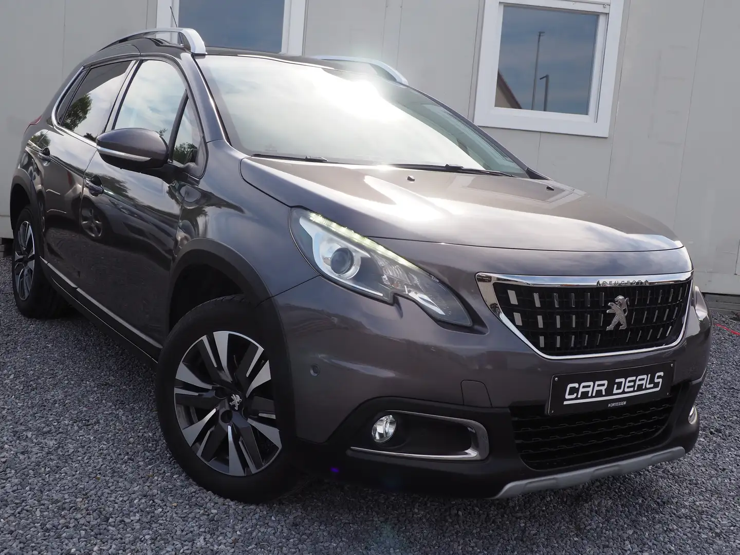 Peugeot 2008 1.2 PureTech Allure S **Pano dak*GPS*Half leer** Grijs - 1