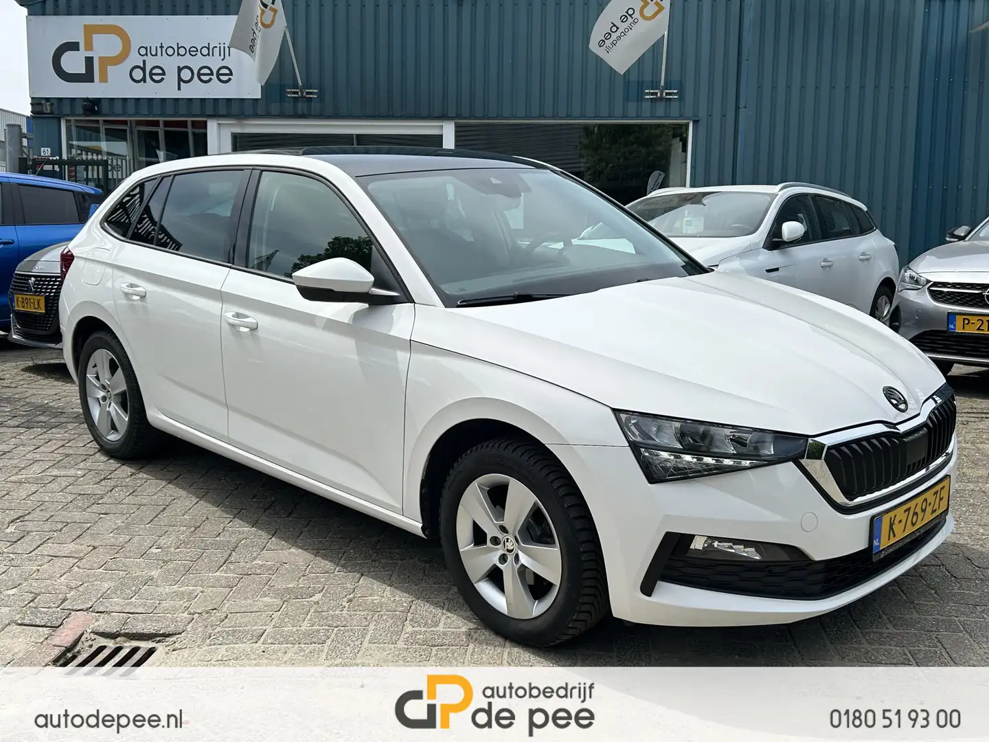 Skoda Scala 1.0 TSI Ambition GARANTIE/AUTOMAAT/CLIMA/CARPLAY/N Wit - 1