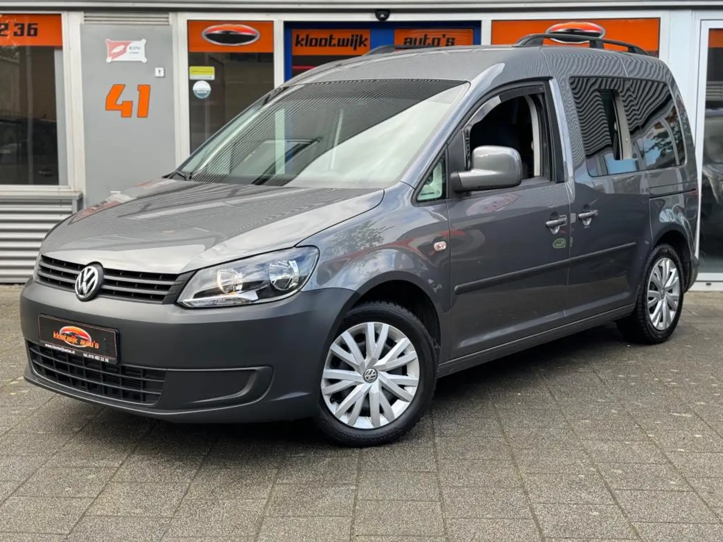 Volkswagen Caddy 1.2 TSI Comfortline Clima Cruise 5-Persoons Trekha Gris - 1