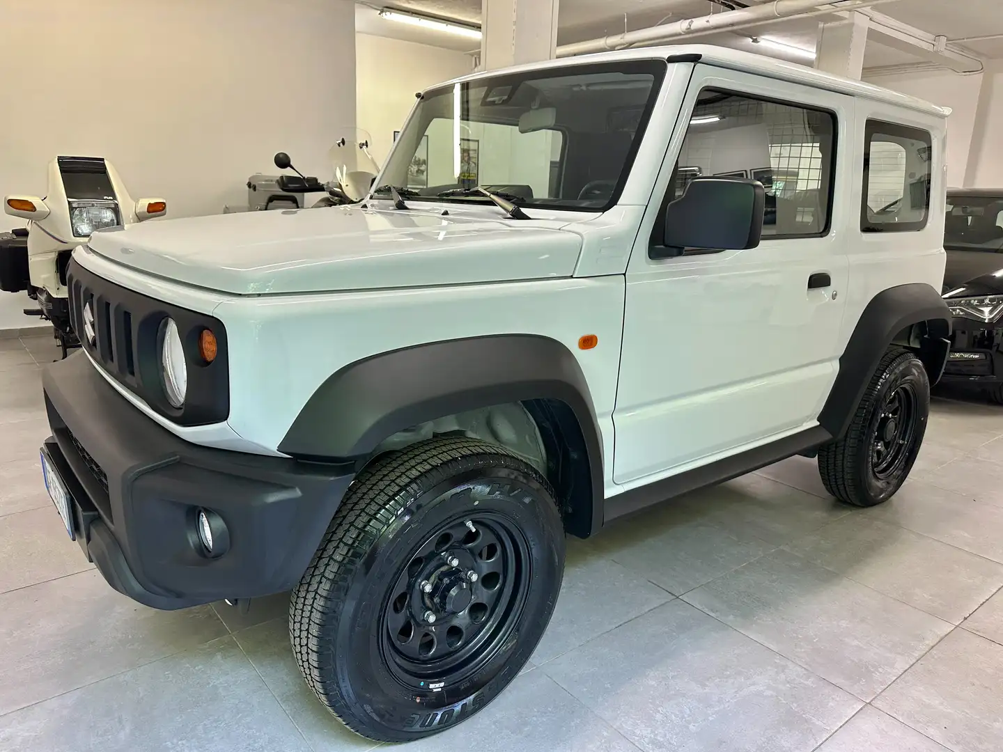 Suzuki Jimny UNIPROP * BOOK SERVICE * NEOP * BIANCO SANTORINI Bianco - 1