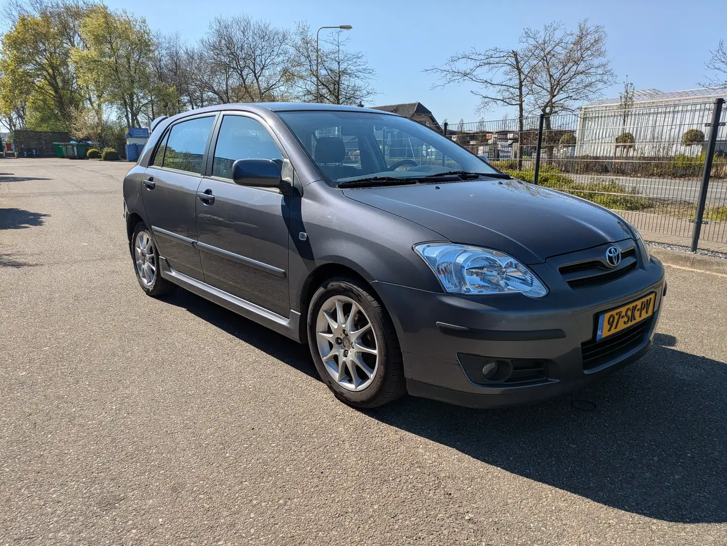 Toyota Corolla Corolla 1.6 VVT-i Sport Ann. Grijs - 1