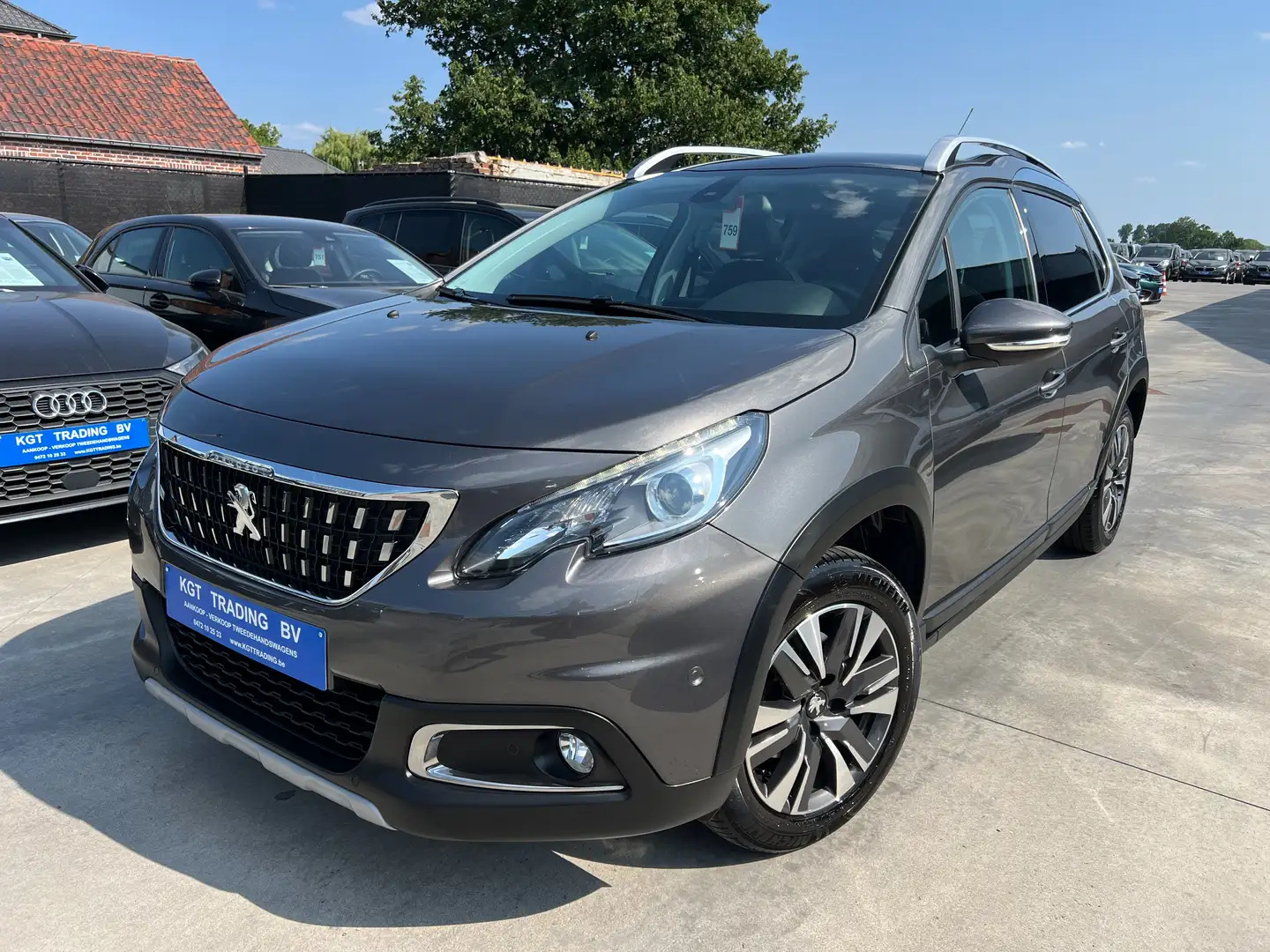 Peugeot 2008 1.2i PURETECH AUTOMAAT NAVI LEDER CAMERA PANO-DAK Grijs - 1