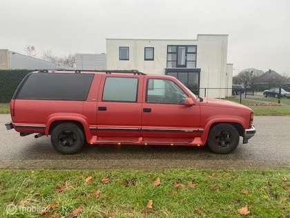 Chevrolet Suburban dubbel cabine grijs kenteken