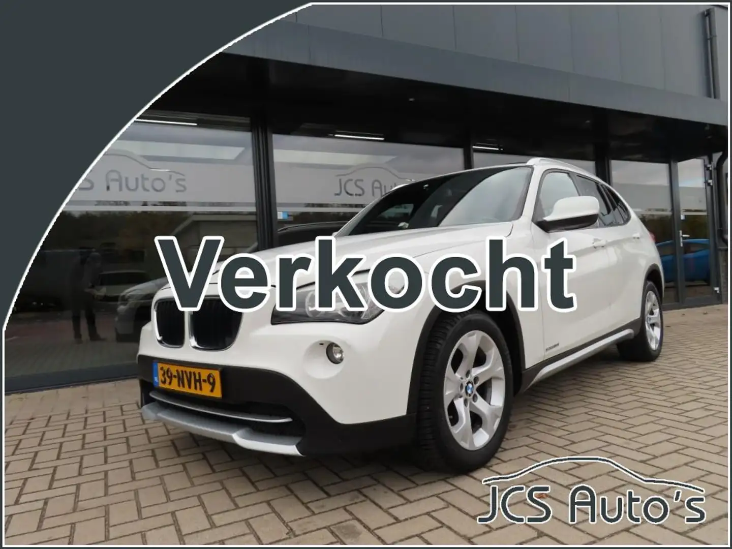 BMW X1 SDrive 18i Executive Aut. Ecc Leder Pano Trekhaak Wit - 1
