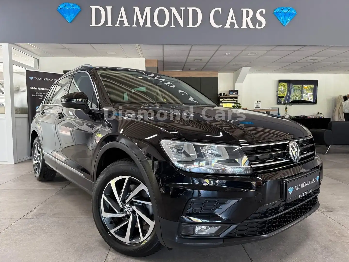 Volkswagen Tiguan Sound* AUTOMATIK * TEMPOMAT * NAVI * Schwarz - 1