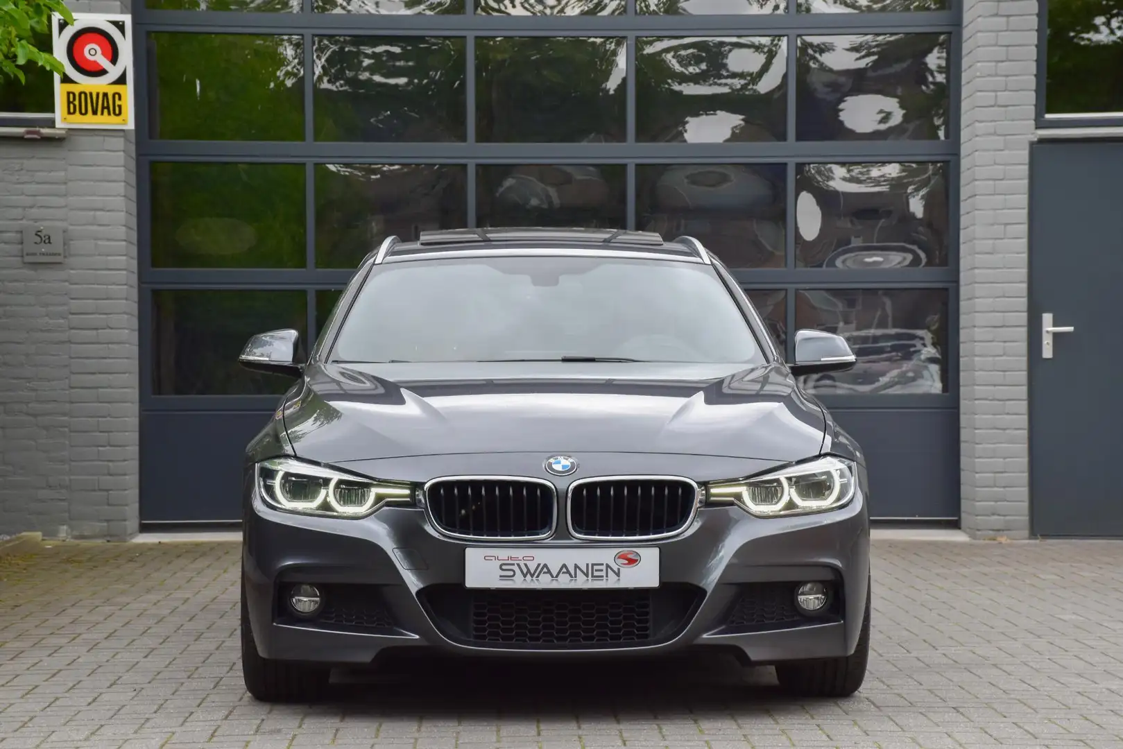 BMW 320 3-serie Touring 320i M sport | Leer | Pano Gris - 2
