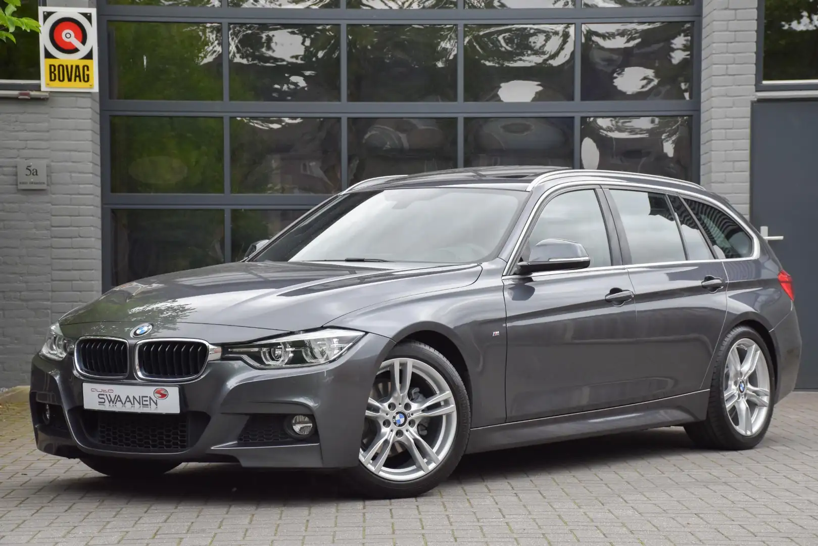 BMW 320 3-serie Touring 320i M sport | Leer | Pano Gris - 1