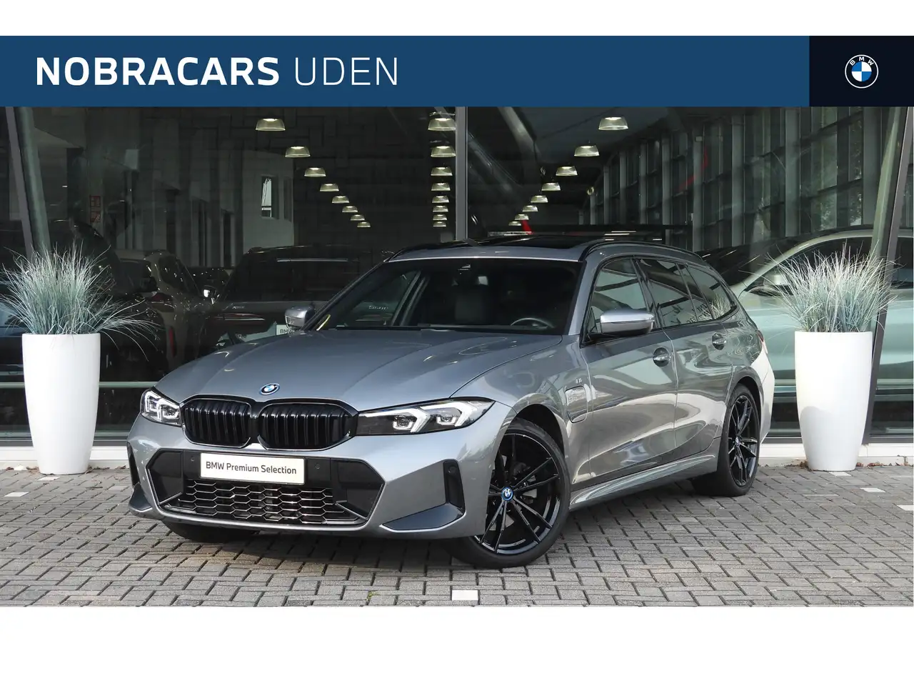 BMW 320 3 Serie Touring 320e M Sport Automaat / Panoramada — photo 1 of 38