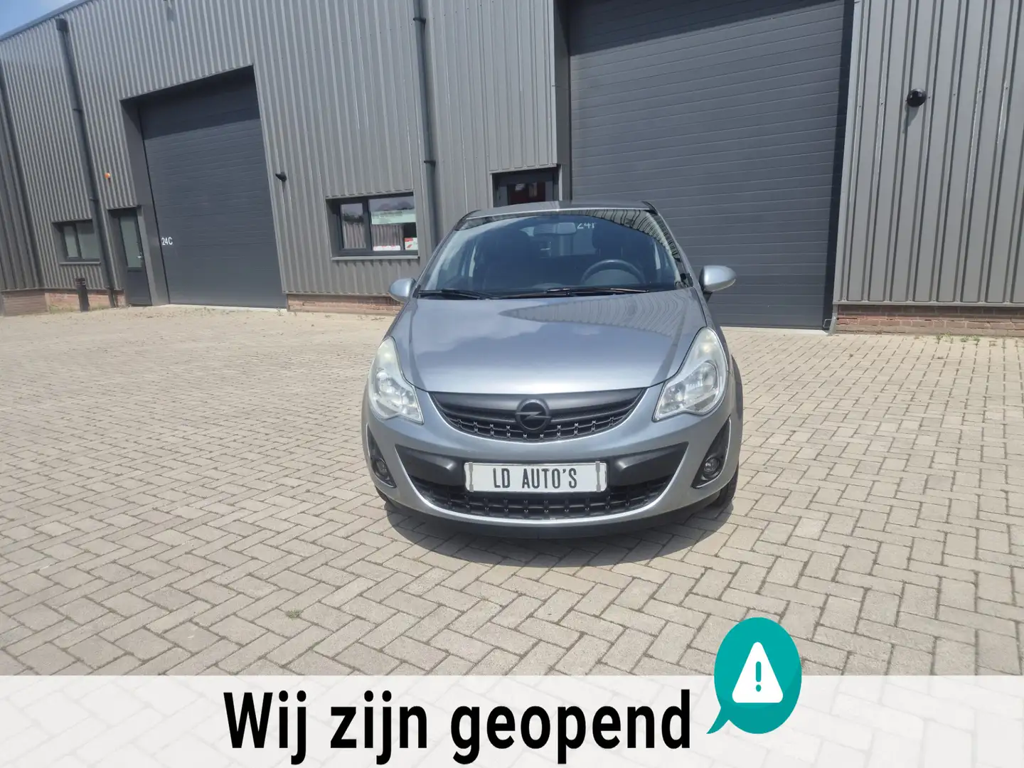 Opel Corsa 1.4-16V Anniversary Edition TOP OCCASION 2e EIGENA Grijs - 2
