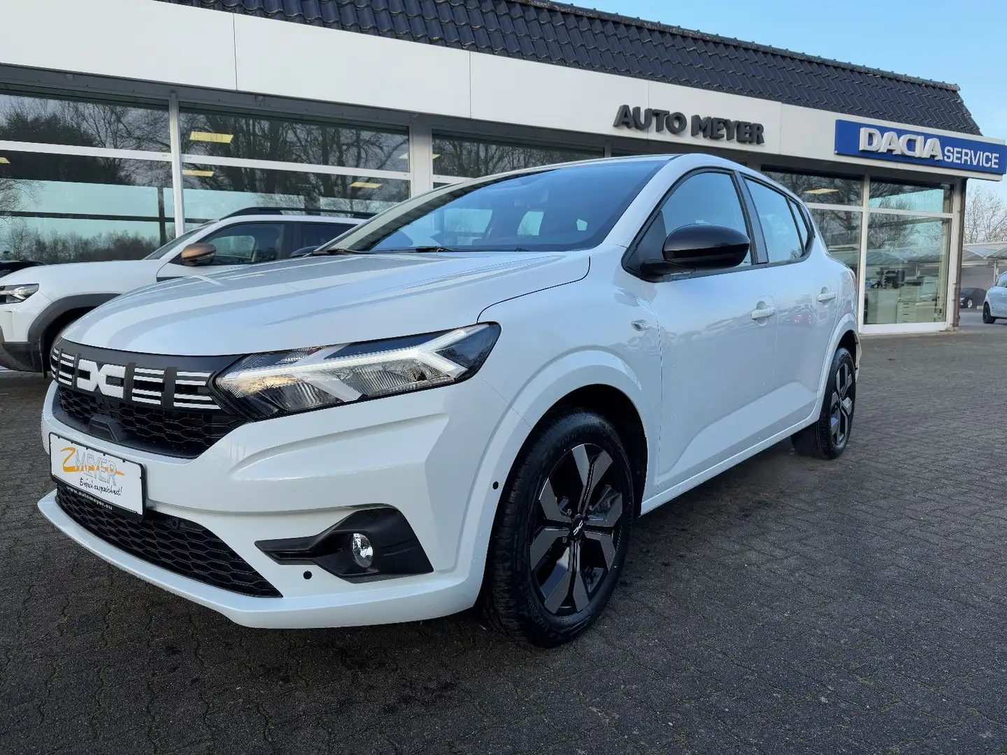 Dacia Sandero Eco-G Journey+ Navi/SHZ/Kamera/PDC/LED Weiß - 1