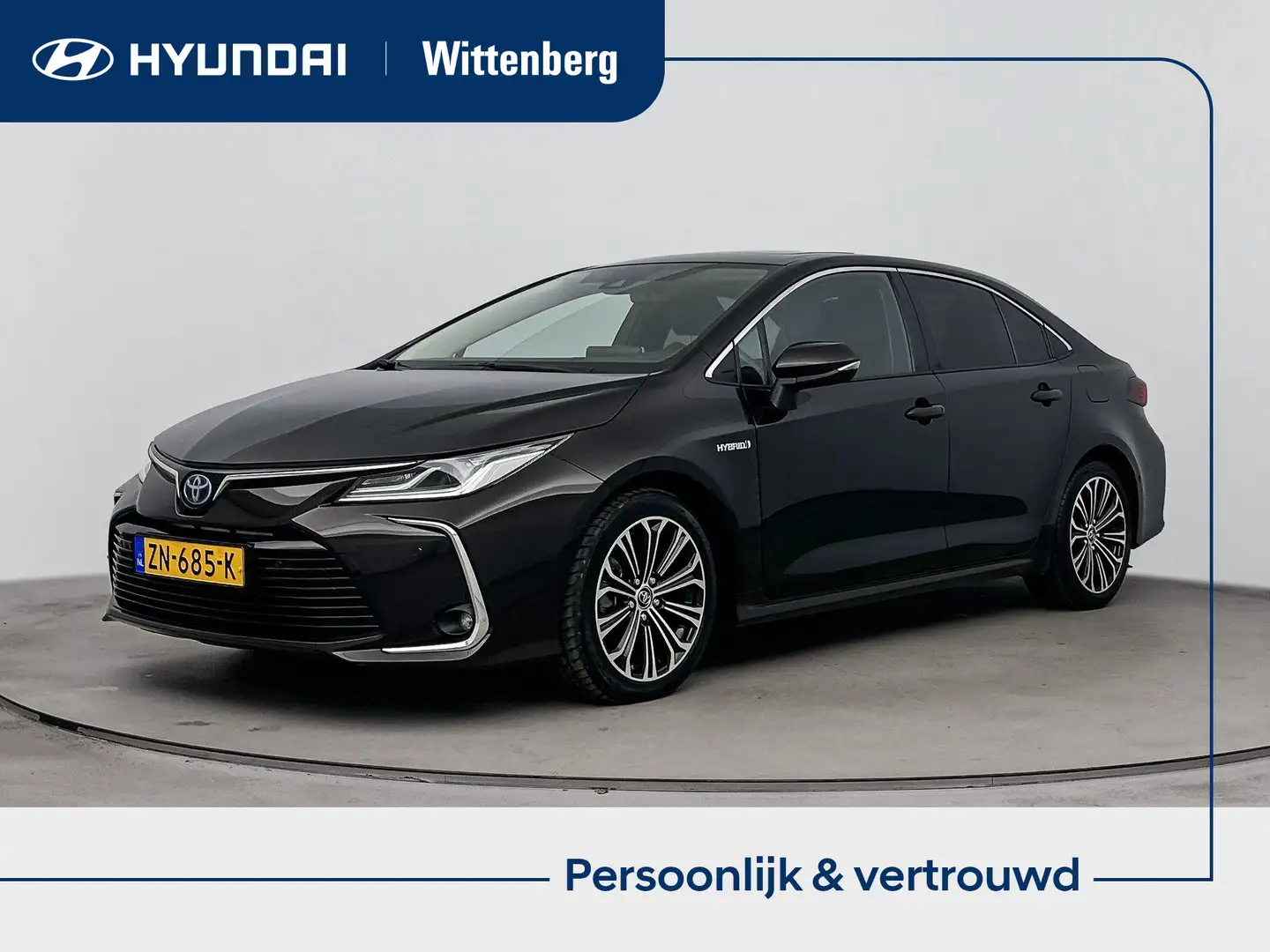 Toyota Corolla 1.8 Hybrid Executive | Lage km-stand! | Leer | Tre Bruin - 1