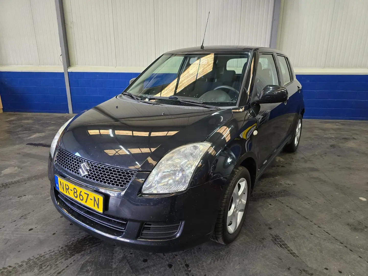 Suzuki Swift 1.3 Comfort Zwart - 1