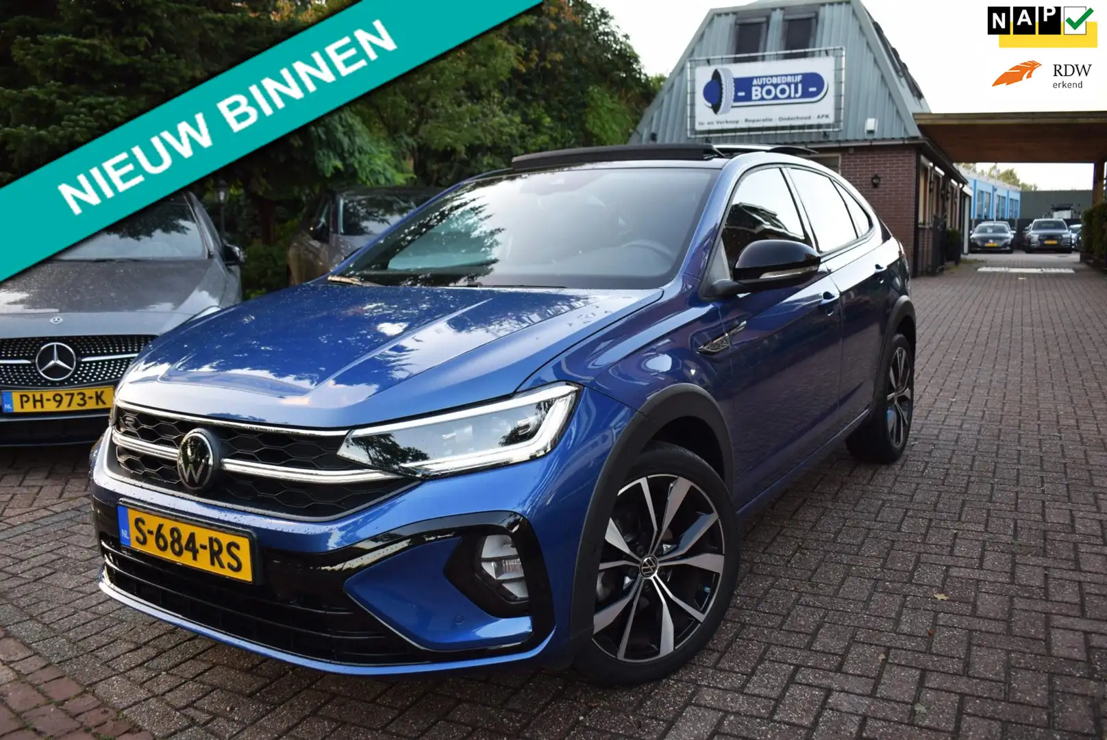 Volkswagen Taigo 110 PK TSI R-Line Business AUTOM/ADAP CRUISE/PANO Blauw - 1