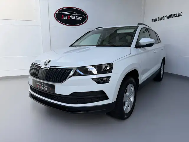 Skoda Karoq 1.0 TSI - Carplay - Caméra + capteur AV/AR - Attache remorque - Keyless - Sièges chauffants - 1 an de garantie